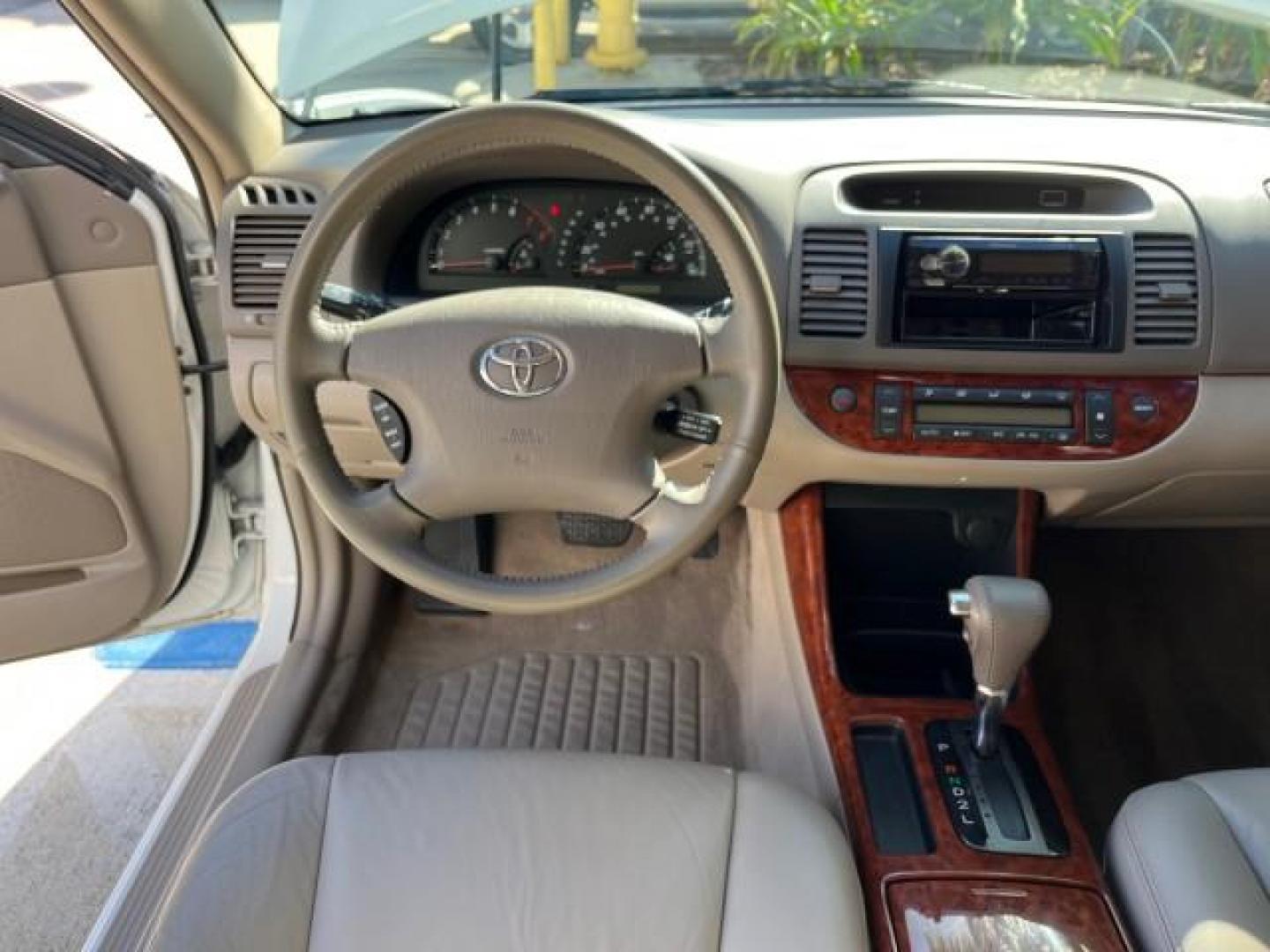 2004 Super White /Stone Toyota Camry XLE LOW MILES 75,074 (4T1BE32K14U) with an 2.4L DOHC MPFI Vvti 16-Valve 4-Cyl Engine engine, Automatic transmission, located at 4701 North Dixie Hwy, Pompano Beach, FL, 33064, (954) 422-2889, 26.240938, -80.123474 - 2004 TOYOTA CAMRY LE ROAD READY 2.4L I4 VIN: 4T1BE32K14U362181 NO ACCIDENTS SEDAN 4 DR WOOD TRIM XLE NO RECALLS 32 MPG 2.4L I4 F DOHC 16V POWER SUNROOF FLORIDA OWNER GASOLINE POWER MIRRORS LOW MILES 75,074 FRONT WHEEL DRIVE POWER LEATHER SEATS 23 SERVICE RECORDS Approach Lights Cruise Control FWD Fr - Photo#37