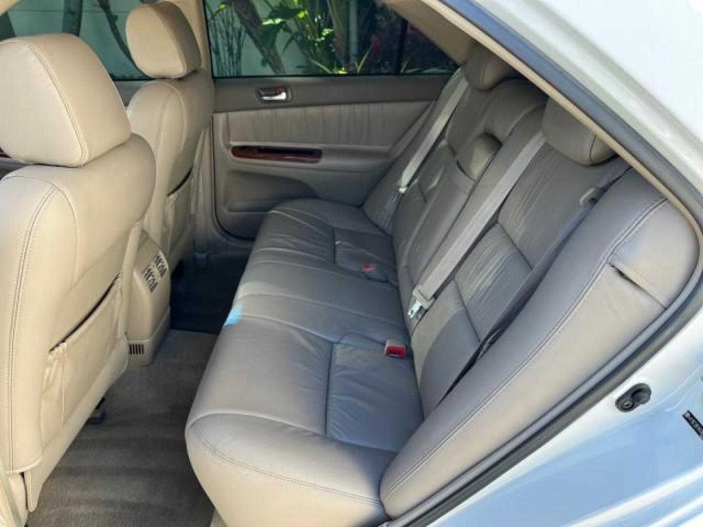 2004 Super White /Stone Toyota Camry XLE LOW MILES 75,074 (4T1BE32K14U) with an 2.4L DOHC MPFI Vvti 16-Valve 4-Cyl Engine engine, Automatic transmission, located at 4701 North Dixie Hwy, Pompano Beach, FL, 33064, (954) 422-2889, 26.240938, -80.123474 - 2004 TOYOTA CAMRY LE ROAD READY 2.4L I4 VIN: 4T1BE32K14U362181 NO ACCIDENTS SEDAN 4 DR WOOD TRIM XLE NO RECALLS 32 MPG 2.4L I4 F DOHC 16V POWER SUNROOF FLORIDA OWNER GASOLINE POWER MIRRORS LOW MILES 75,074 FRONT WHEEL DRIVE POWER LEATHER SEATS 23 SERVICE RECORDS Approach Lights Cruise Control FWD Fr - Photo#39