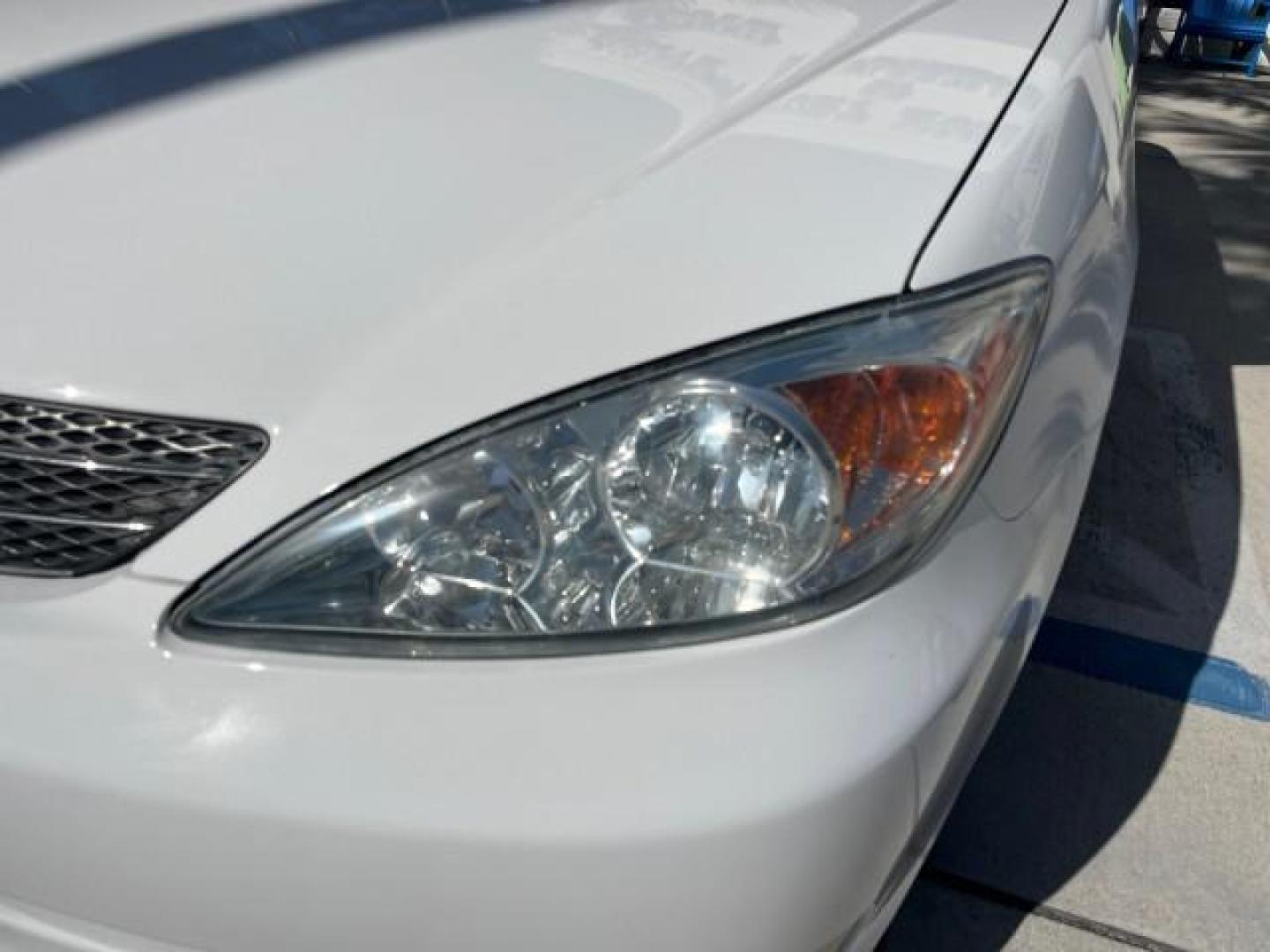 2004 Super White /Stone Toyota Camry XLE LOW MILES 75,074 (4T1BE32K14U) with an 2.4L DOHC MPFI Vvti 16-Valve 4-Cyl Engine engine, Automatic transmission, located at 4701 North Dixie Hwy, Pompano Beach, FL, 33064, (954) 422-2889, 26.240938, -80.123474 - 2004 TOYOTA CAMRY LE ROAD READY 2.4L I4 VIN: 4T1BE32K14U362181 NO ACCIDENTS SEDAN 4 DR WOOD TRIM XLE NO RECALLS 32 MPG 2.4L I4 F DOHC 16V POWER SUNROOF FLORIDA OWNER GASOLINE POWER MIRRORS LOW MILES 75,074 FRONT WHEEL DRIVE POWER LEATHER SEATS 23 SERVICE RECORDS Approach Lights Cruise Control FWD Fr - Photo#82