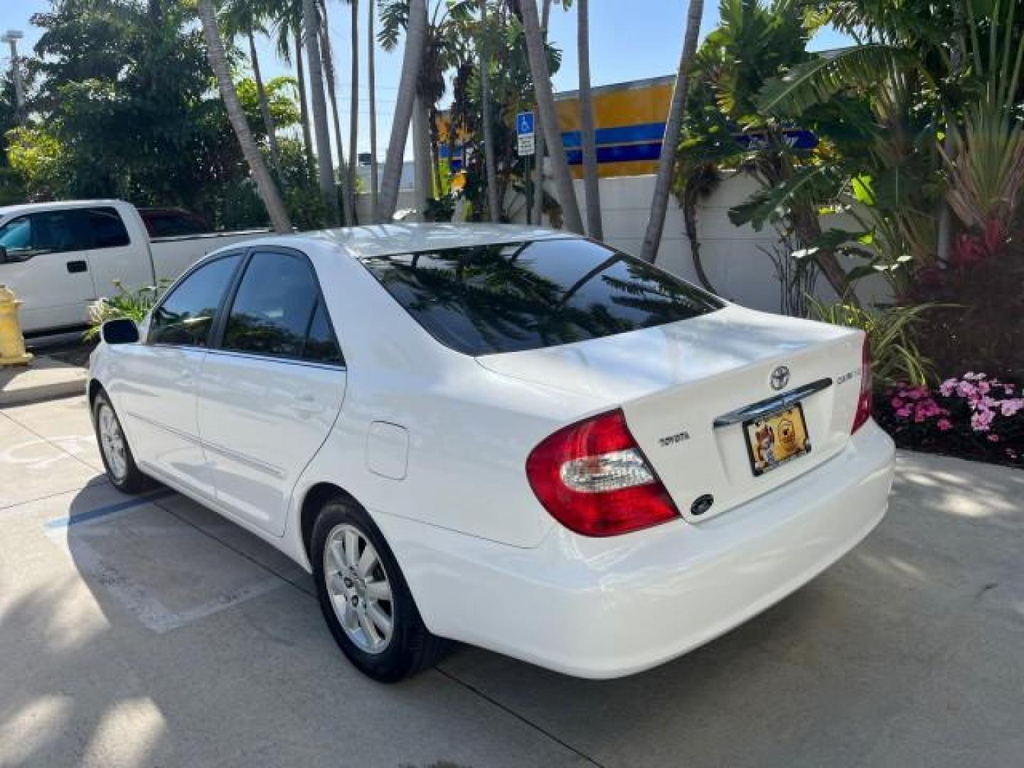 2004 Super White /Stone Toyota Camry XLE LOW MILES 75,074 (4T1BE32K14U) with an 2.4L DOHC MPFI Vvti 16-Valve 4-Cyl Engine engine, Automatic transmission, located at 4701 North Dixie Hwy, Pompano Beach, FL, 33064, (954) 422-2889, 26.240938, -80.123474 - 2004 TOYOTA CAMRY LE ROAD READY 2.4L I4 VIN: 4T1BE32K14U362181 NO ACCIDENTS SEDAN 4 DR WOOD TRIM XLE NO RECALLS 32 MPG 2.4L I4 F DOHC 16V POWER SUNROOF FLORIDA OWNER GASOLINE POWER MIRRORS LOW MILES 75,074 FRONT WHEEL DRIVE POWER LEATHER SEATS 23 SERVICE RECORDS Approach Lights Cruise Control FWD Fr - Photo#98