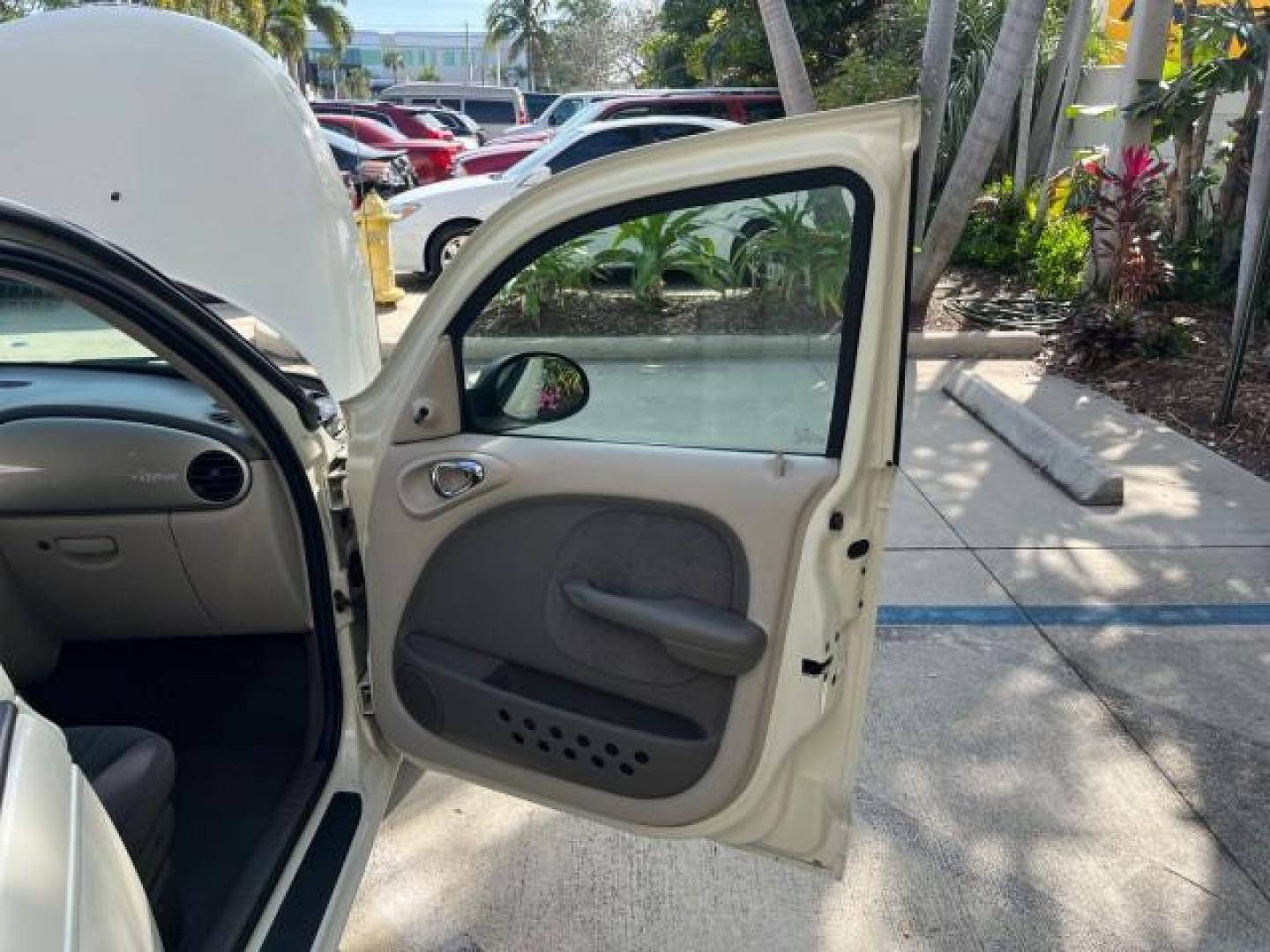 2004 Light Almond Pearl Metallic /Taupe/Pearl Beige Chrysler PT Cruiser LOW MILES 22,047 (3C4FY48B64T) with an 2.4L DOHC SMPI 16-Valve I4 Engine engine, Automatic transmission, located at 4701 North Dixie Hwy, Pompano Beach, FL, 33064, (954) 422-2889, 26.240938, -80.123474 - 2004 CHRYSLER PT CRUISER ROAD READY 2.4L I4 VIN: 3C4FY48B64T349933 NO ACCIDENTS 2.4L I4 F DOHC 16V NO RECALLS 29 MPG GASOLINE LOW MILES 22,047 FRONT WHEEL DRIVE 3 SERVICE RECORDS Approach Lights FWD Front Bucket Seats THIS IS ONE OF THE NICEST CHRYSLERS WE HAVE EVER LISTED RETIREE ALABAMA TITLE THIS - Photo#11