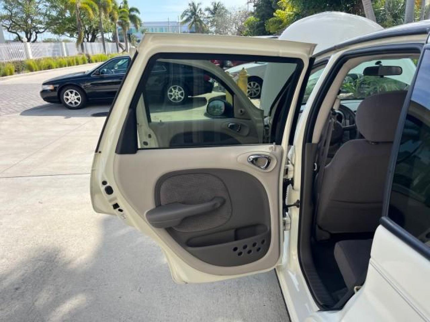 2004 Light Almond Pearl Metallic /Taupe/Pearl Beige Chrysler PT Cruiser LOW MILES 22,047 (3C4FY48B64T) with an 2.4L DOHC SMPI 16-Valve I4 Engine engine, Automatic transmission, located at 4701 North Dixie Hwy, Pompano Beach, FL, 33064, (954) 422-2889, 26.240938, -80.123474 - 2004 CHRYSLER PT CRUISER ROAD READY 2.4L I4 VIN: 3C4FY48B64T349933 NO ACCIDENTS 2.4L I4 F DOHC 16V NO RECALLS 29 MPG GASOLINE LOW MILES 22,047 FRONT WHEEL DRIVE 3 SERVICE RECORDS Approach Lights FWD Front Bucket Seats THIS IS ONE OF THE NICEST CHRYSLERS WE HAVE EVER LISTED RETIREE ALABAMA TITLE THIS - Photo#13