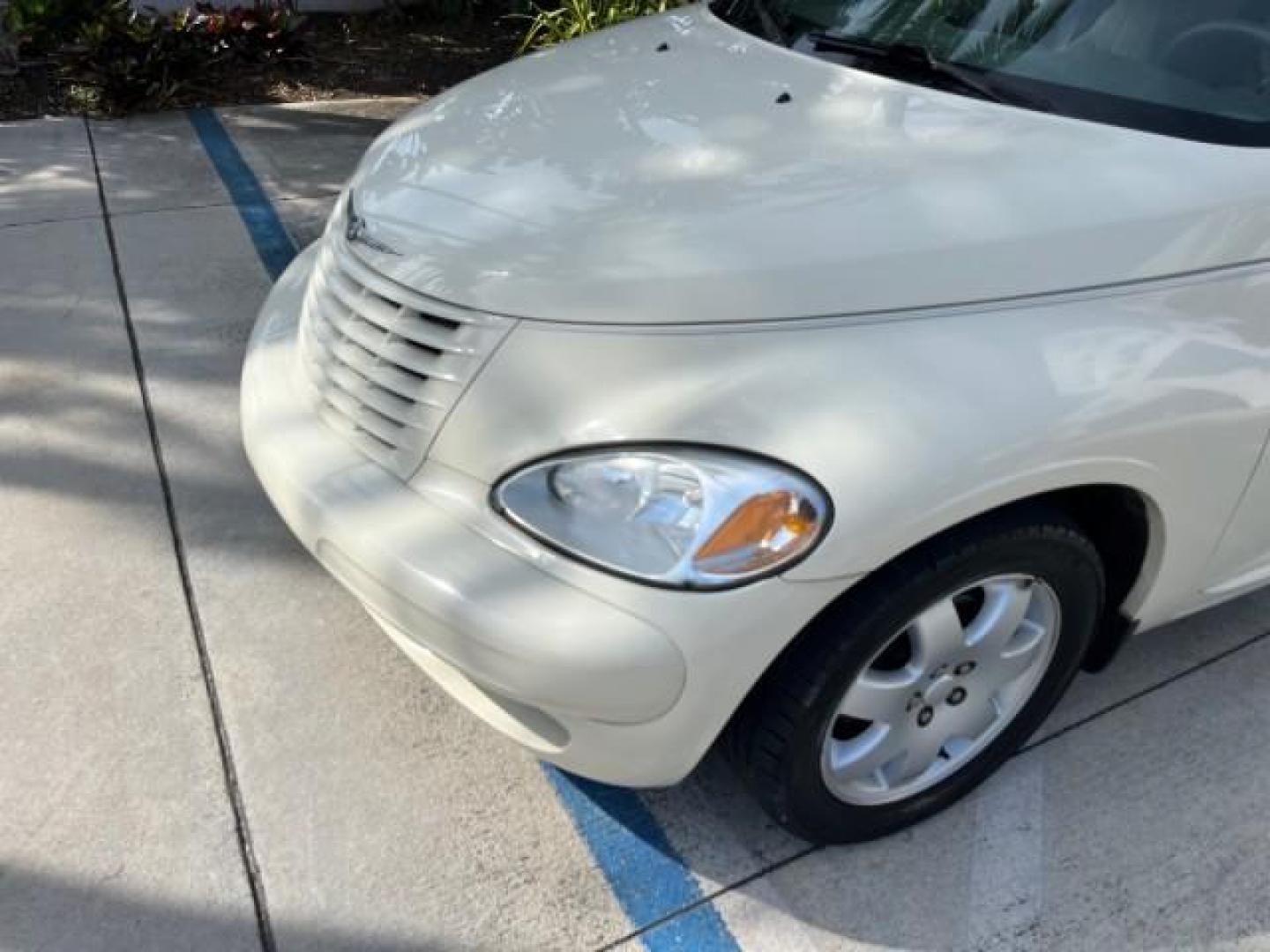 2004 Light Almond Pearl Metallic /Taupe/Pearl Beige Chrysler PT Cruiser LOW MILES 22,047 (3C4FY48B64T) with an 2.4L DOHC SMPI 16-Valve I4 Engine engine, Automatic transmission, located at 4701 North Dixie Hwy, Pompano Beach, FL, 33064, (954) 422-2889, 26.240938, -80.123474 - 2004 CHRYSLER PT CRUISER ROAD READY 2.4L I4 VIN: 3C4FY48B64T349933 NO ACCIDENTS 2.4L I4 F DOHC 16V NO RECALLS 29 MPG GASOLINE LOW MILES 22,047 FRONT WHEEL DRIVE 3 SERVICE RECORDS Approach Lights FWD Front Bucket Seats THIS IS ONE OF THE NICEST CHRYSLERS WE HAVE EVER LISTED RETIREE ALABAMA TITLE THIS - Photo#84