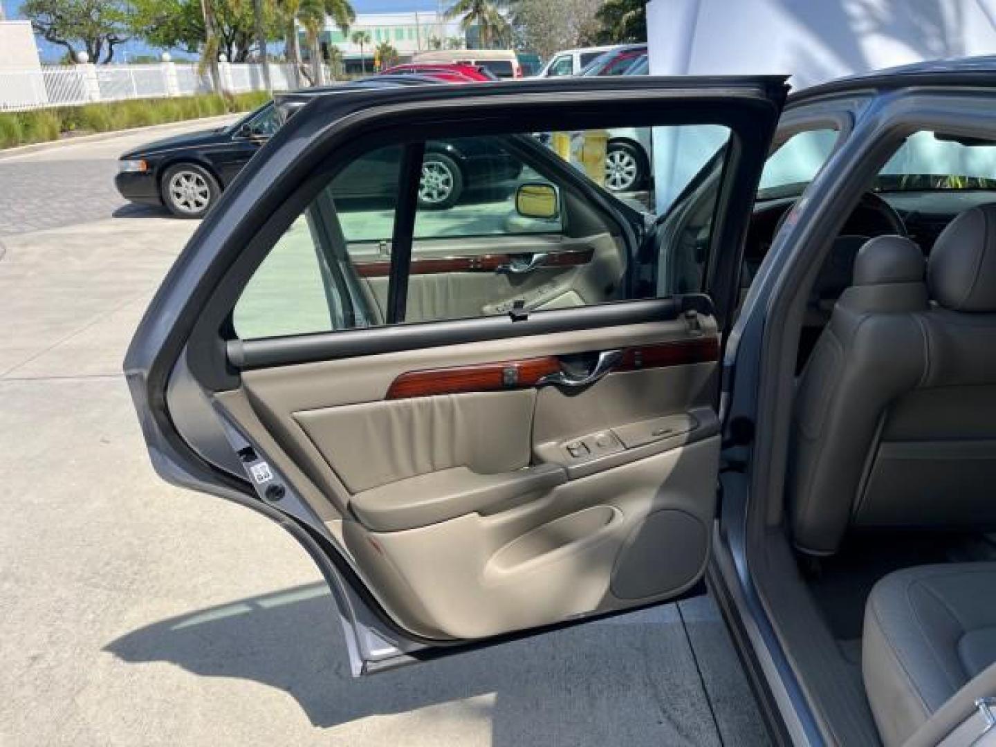 2004 Blue Ice /Shale Cadillac DeVille 1 FL DHS LOW MILES 51,789 (1G6KE57YX4U) with an 4.6L DOHC V8 Northstar Engine engine, Automatic transmission, located at 4701 North Dixie Hwy, Pompano Beach, FL, 33064, (954) 422-2889, 26.240938, -80.123474 - OUR WEBPAGE FLORIDACARS1.COM HAS OVER 100 PHOTOS AND FREE CARFAX LINK 2004 CADILLAC DEVILLE DHS NEW $51,035 ROAD READY VIN: 1G6KE57YX4U207337 NO ACCIDENTS NO RECALLS SEDAN 4 DR 1 OWNER FLORIDA 4.6L V8 4.6L V8 F DOHC LOW MILES 51,789 26 MPG GASOLINE DUAL ZONE AC BACK UP SENSORS 26 SERVICE RECORDS FRO - Photo#13