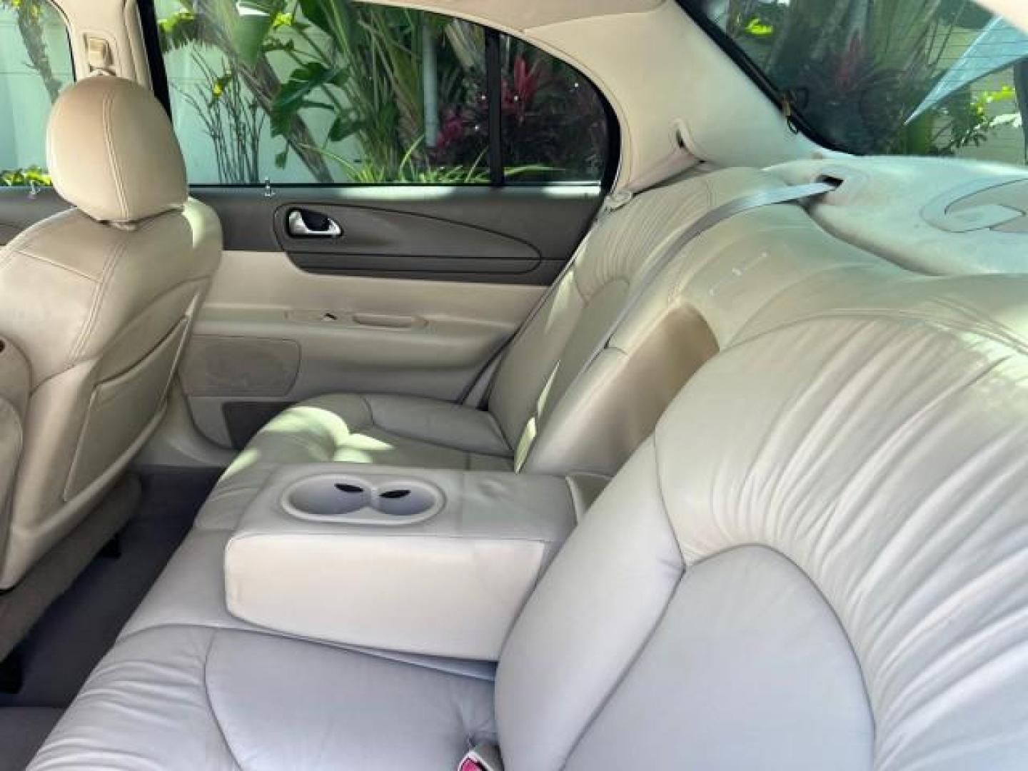 2001 White Pearlescent Metallic /Light Parchment Lincoln Continental 1 FL LOW MILES 65,765 (1LNHM97V51Y) with an 4.6L DOHC 32-Valve V8 Intech Engine engine, Automatic transmission, located at 4701 North Dixie Hwy, Pompano Beach, FL, 33064, (954) 422-2889, 26.240938, -80.123474 - 2001 LINCOLN CONTINENTAL NEW $39,700 ROAD READY VIN: 1LNHM97V51Y736217 NO ACCIDENTS SEDAN 4 DR NO RECALLS 4,6L V8 4.6L V8 F DOHC 32V 1 OWNER FLORIDA GASOLINE POWER MIRRORS 30 SERVICE RECORDS FRONT WHEEL DRIVE POWER LEATHER SEATS LOW MILES 65,765 Adjustable Lumbar Support Air Suspension Alloy Wheels - Photo#36