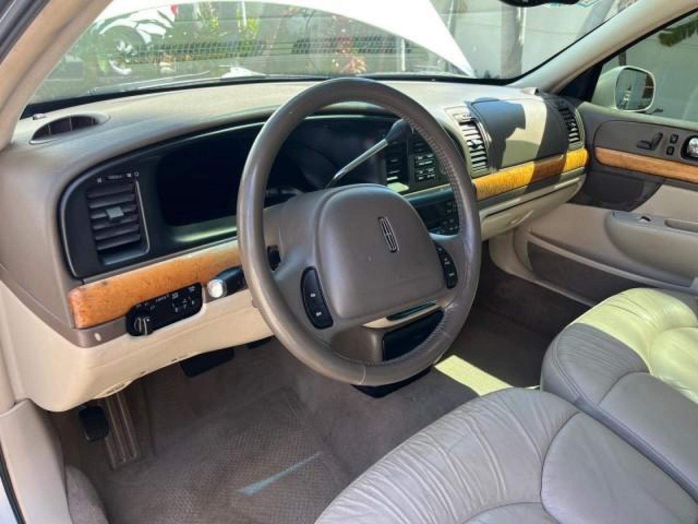 2001 White Pearlescent Metallic /Light Parchment Lincoln Continental 1 FL LOW MILES 65,765 (1LNHM97V51Y) with an 4.6L DOHC 32-Valve V8 Intech Engine engine, Automatic transmission, located at 4701 North Dixie Hwy, Pompano Beach, FL, 33064, (954) 422-2889, 26.240938, -80.123474 - 2001 LINCOLN CONTINENTAL NEW $39,700 ROAD READY VIN: 1LNHM97V51Y736217 NO ACCIDENTS SEDAN 4 DR NO RECALLS 4,6L V8 4.6L V8 F DOHC 32V 1 OWNER FLORIDA GASOLINE POWER MIRRORS 30 SERVICE RECORDS FRONT WHEEL DRIVE POWER LEATHER SEATS LOW MILES 65,765 Adjustable Lumbar Support Air Suspension Alloy Wheels - Photo#41