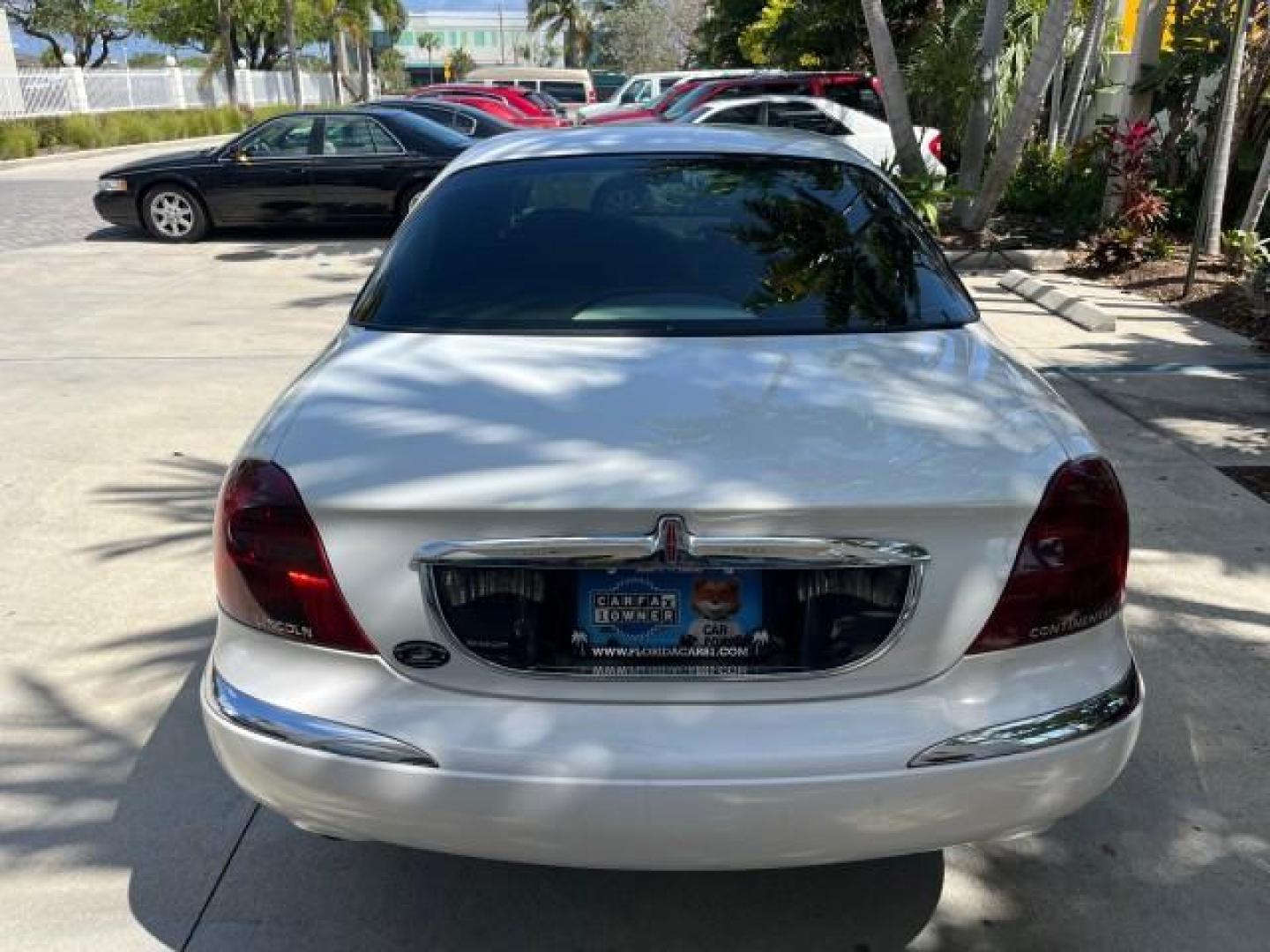 2001 White Pearlescent Metallic /Light Parchment Lincoln Continental 1 FL LOW MILES 65,765 (1LNHM97V51Y) with an 4.6L DOHC 32-Valve V8 Intech Engine engine, Automatic transmission, located at 4701 North Dixie Hwy, Pompano Beach, FL, 33064, (954) 422-2889, 26.240938, -80.123474 - 2001 LINCOLN CONTINENTAL NEW $39,700 ROAD READY VIN: 1LNHM97V51Y736217 NO ACCIDENTS SEDAN 4 DR NO RECALLS 4,6L V8 4.6L V8 F DOHC 32V 1 OWNER FLORIDA GASOLINE POWER MIRRORS 30 SERVICE RECORDS FRONT WHEEL DRIVE POWER LEATHER SEATS LOW MILES 65,765 Adjustable Lumbar Support Air Suspension Alloy Wheels - Photo#88