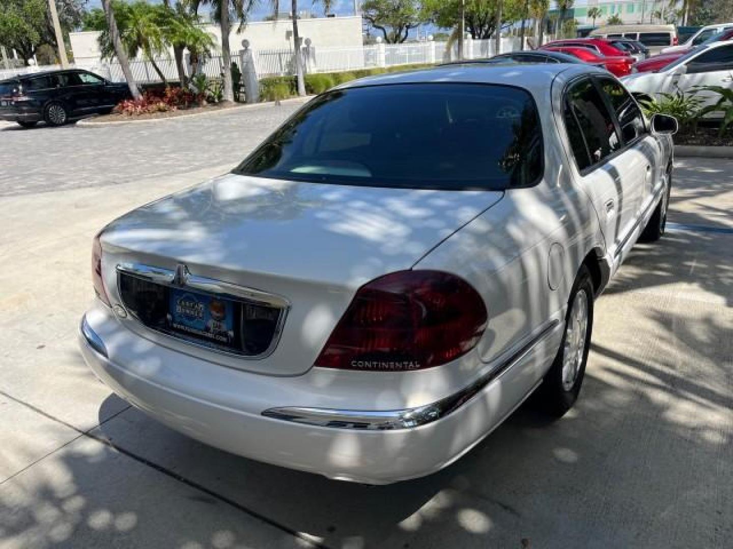 2001 White Pearlescent Metallic /Light Parchment Lincoln Continental 1 FL LOW MILES 65,765 (1LNHM97V51Y) with an 4.6L DOHC 32-Valve V8 Intech Engine engine, Automatic transmission, located at 4701 North Dixie Hwy, Pompano Beach, FL, 33064, (954) 422-2889, 26.240938, -80.123474 - 2001 LINCOLN CONTINENTAL NEW $39,700 ROAD READY VIN: 1LNHM97V51Y736217 NO ACCIDENTS SEDAN 4 DR NO RECALLS 4,6L V8 4.6L V8 F DOHC 32V 1 OWNER FLORIDA GASOLINE POWER MIRRORS 30 SERVICE RECORDS FRONT WHEEL DRIVE POWER LEATHER SEATS LOW MILES 65,765 Adjustable Lumbar Support Air Suspension Alloy Wheels - Photo#90