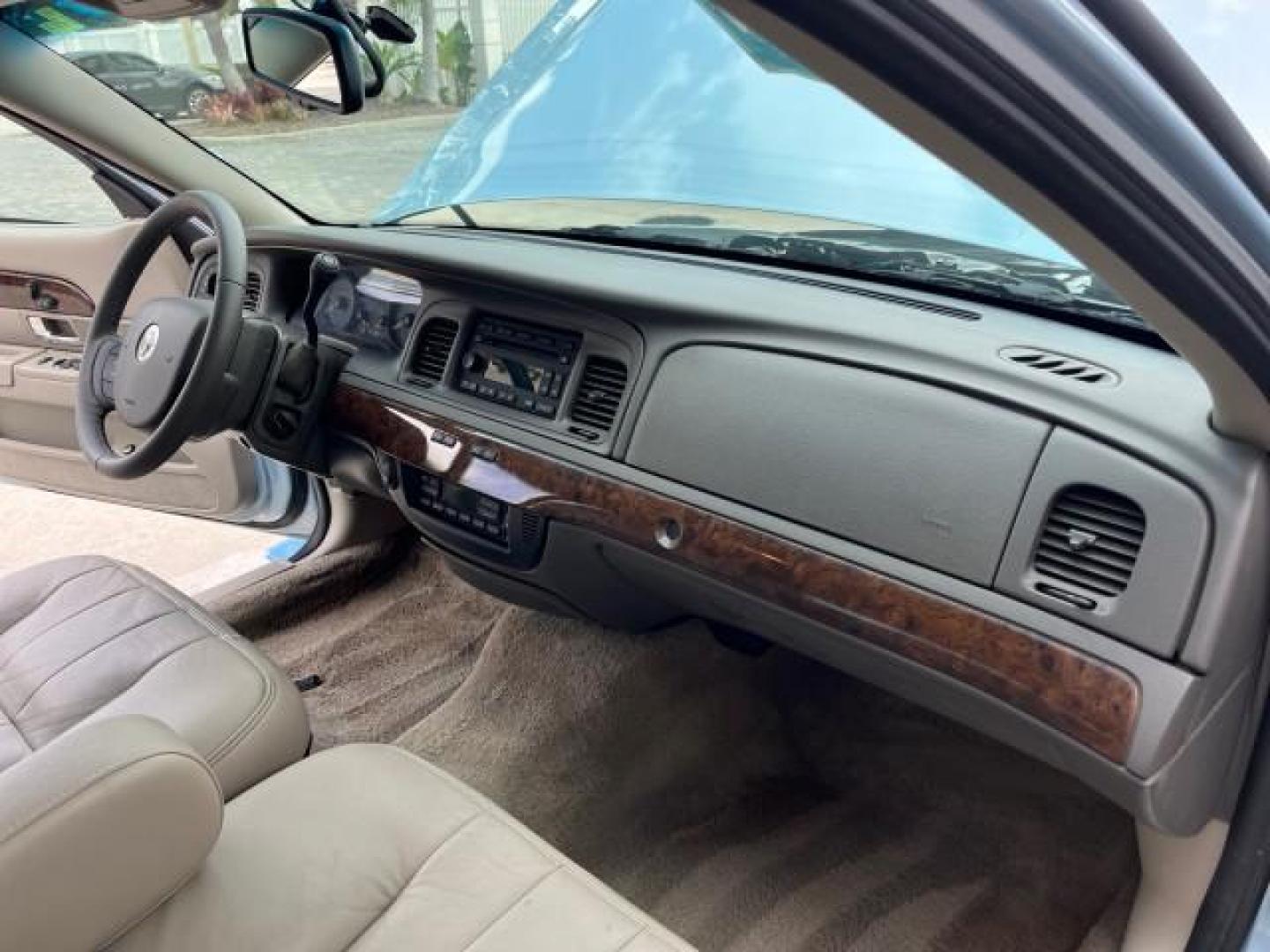 2008 Norsea Blue Metallic /Light Camel Mercury Grand Marquis LS LOW MILES 43,663 (2MEFM75V58X) with an 4.6L OHC FFV V8 Engine engine, Automatic transmission, located at 4701 North Dixie Hwy, Pompano Beach, FL, 33064, (954) 422-2889, 26.240938, -80.123474 - 2008 MERCURY GRAND MARQUIS LS ROAD READY 4.6L V8 VIN: 2MEFM75V58X652510 NO ACCIDENTS SEDAN 4 DR NO RECALLS 4.6L V8 F SOHC LOW MILES 43,663 FLEX FUEL POWER LEATHER SEATS REAR WHEEL DRIVE 7 SERVICE RECORDS Adaptive Headlights Adjustable Lumbar Support Auto-dimming Rearview Mirror Chrome Grille Electro - Photo#27