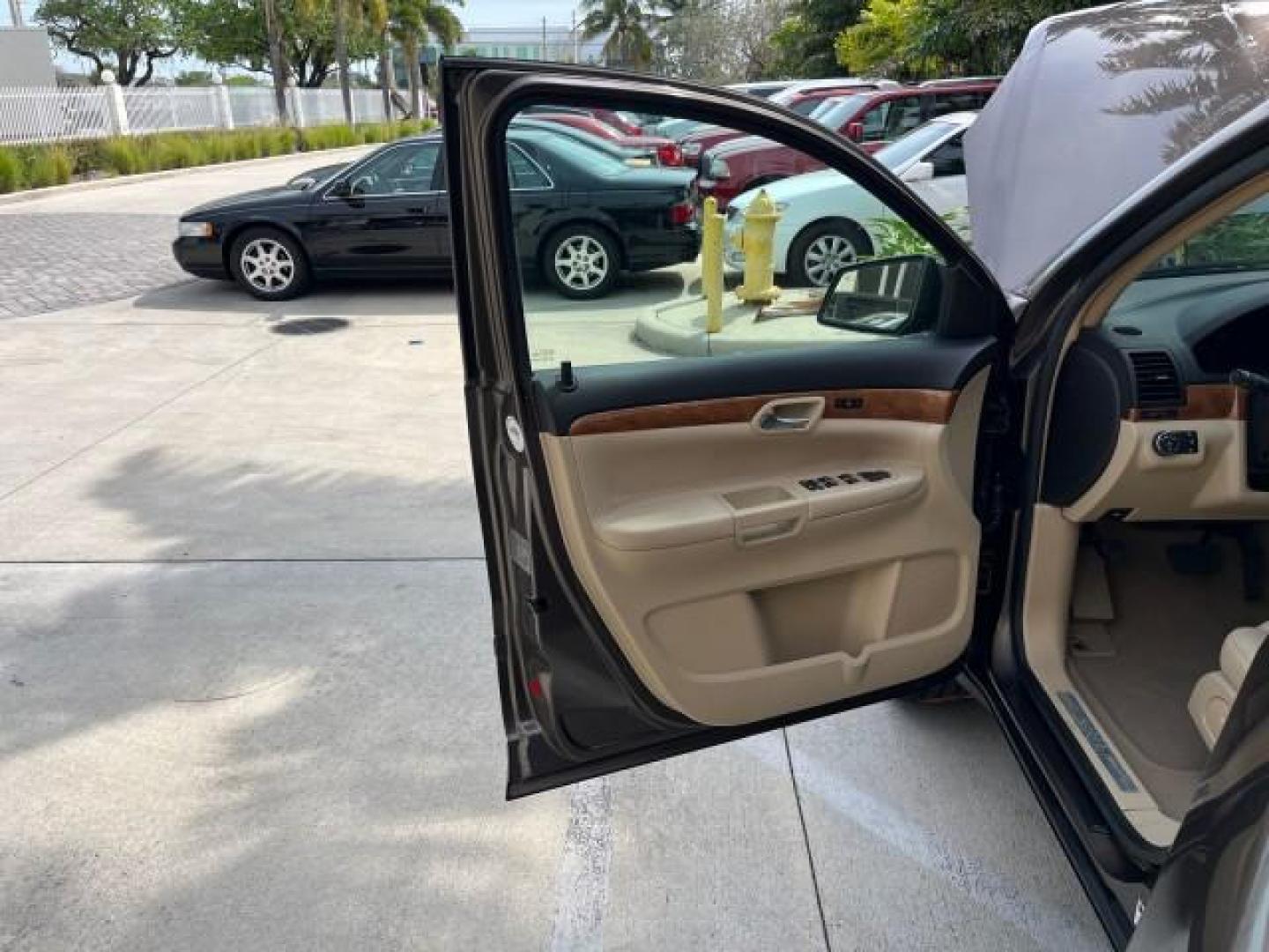 2008 Cocoa /Tan Saturn Outlook 1 FL XR AWD LO MI 31,119 (5GZEV33728J) with an 3.6L VVT V6 Engine engine, Automatic transmission, located at 4701 North Dixie Hwy, Pompano Beach, FL, 33064, (954) 422-2889, 26.240938, -80.123474 - 2008 SATURN OUTLOOK XR NEW $45,010 ROAD READY VIN: 5GZEV33728J174352 NO ACCIDENTS NO RECALLS 4 DOOR WAGON/SPORT UTILITY LOADED 1 OWNER FLORIDA 3.6L V6 3.6L V6 F NAVIGATION BACK UP CAMERA LOW MILES 31,119 AWD GASOLINE ALL WHEEL DRIVE POWER LEATHER SEATS/MIRRORS ALL WHEEL DRIVE 3 ROW SEATS DOUBLE SUNR - Photo#9