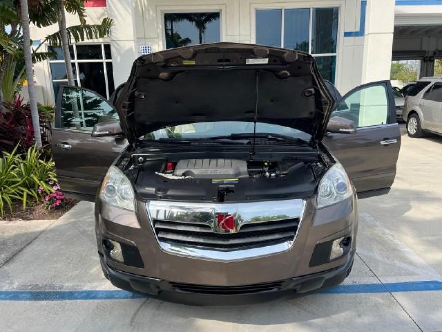 2008 Cocoa /Tan Saturn Outlook 1 FL XR AWD LO MI 31,119 (5GZEV33728J) with an 3.6L VVT V6 Engine engine, Automatic transmission, located at 4701 North Dixie Hwy, Pompano Beach, FL, 33064, (954) 422-2889, 26.240938, -80.123474 - 2008 SATURN OUTLOOK XR NEW $45,010 ROAD READY VIN: 5GZEV33728J174352 NO ACCIDENTS NO RECALLS 4 DOOR WAGON/SPORT UTILITY LOADED 1 OWNER FLORIDA 3.6L V6 3.6L V6 F NAVIGATION BACK UP CAMERA LOW MILES 31,119 AWD GASOLINE ALL WHEEL DRIVE POWER LEATHER SEATS/MIRRORS ALL WHEEL DRIVE 3 ROW SEATS DOUBLE SUNR - Photo#16