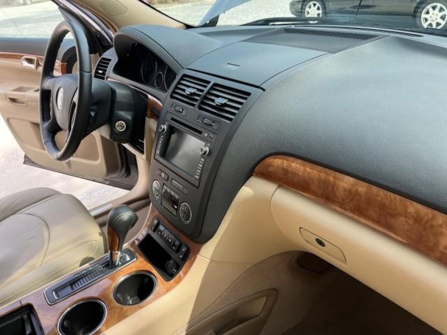 2008 Cocoa /Tan Saturn Outlook 1 FL XR AWD LO MI 31,119 (5GZEV33728J) with an 3.6L VVT V6 Engine engine, Automatic transmission, located at 4701 North Dixie Hwy, Pompano Beach, FL, 33064, (954) 422-2889, 26.240938, -80.123474 - 2008 SATURN OUTLOOK XR NEW $45,010 ROAD READY VIN: 5GZEV33728J174352 NO ACCIDENTS NO RECALLS 4 DOOR WAGON/SPORT UTILITY LOADED 1 OWNER FLORIDA 3.6L V6 3.6L V6 F NAVIGATION BACK UP CAMERA LOW MILES 31,119 AWD GASOLINE ALL WHEEL DRIVE POWER LEATHER SEATS/MIRRORS ALL WHEEL DRIVE 3 ROW SEATS DOUBLE SUNR - Photo#31