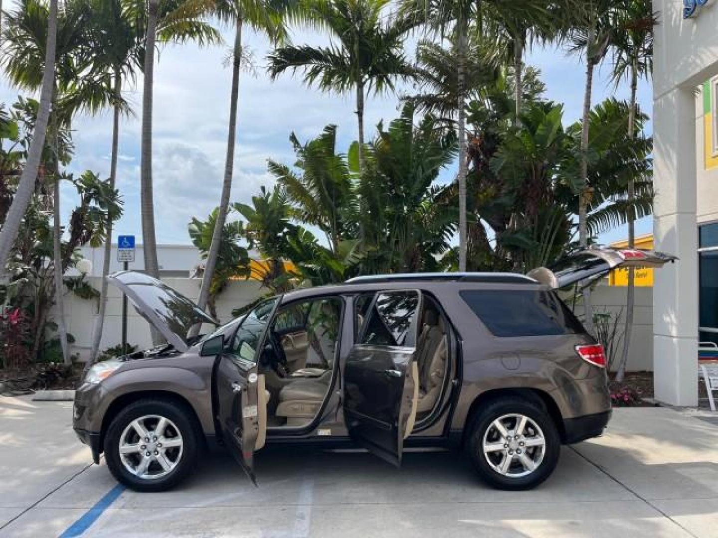 2008 Cocoa /Tan Saturn Outlook 1 FL XR AWD LO MI 31,119 (5GZEV33728J) with an 3.6L VVT V6 Engine engine, Automatic transmission, located at 4701 North Dixie Hwy, Pompano Beach, FL, 33064, (954) 422-2889, 26.240938, -80.123474 - 2008 SATURN OUTLOOK XR NEW $45,010 ROAD READY VIN: 5GZEV33728J174352 NO ACCIDENTS NO RECALLS 4 DOOR WAGON/SPORT UTILITY LOADED 1 OWNER FLORIDA 3.6L V6 3.6L V6 F NAVIGATION BACK UP CAMERA LOW MILES 31,119 AWD GASOLINE ALL WHEEL DRIVE POWER LEATHER SEATS/MIRRORS ALL WHEEL DRIVE 3 ROW SEATS DOUBLE SUNR - Photo#8