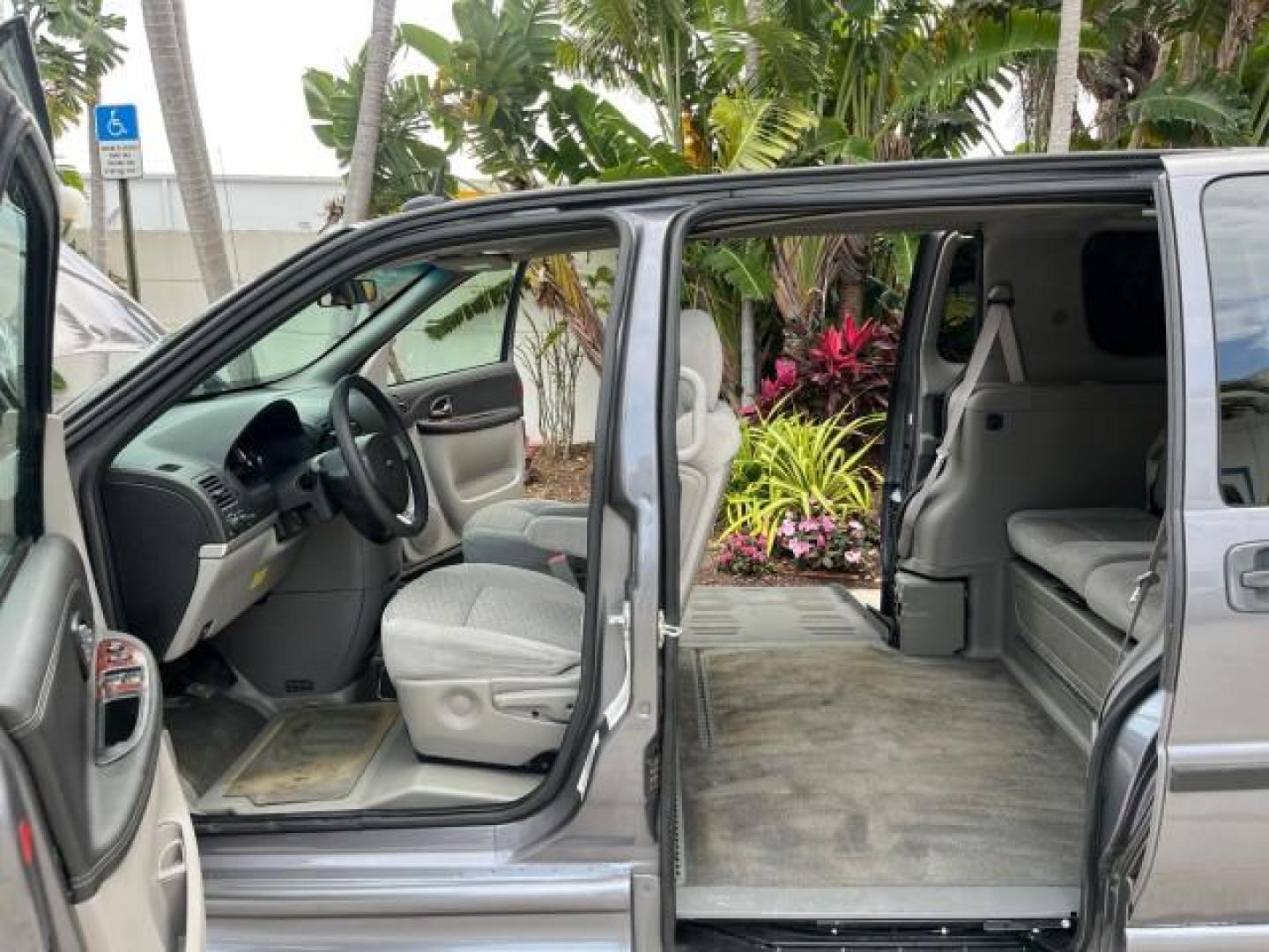 2007 Silverstone Metallic /Medium Gray Chevrolet Uplander BRAUN ENTERVAN LOWERED FLOOR 54.133 (1GBDV13177D) with an 3.9L V6 SFI Engine engine, Automatic transmission, located at 4701 North Dixie Hwy, Pompano Beach, FL, 33064, (954) 422-2889, 26.240938, -80.123474 - 2007 CHEVROLET UPLANDER BRAUN ENTERVAN ROAD READY 3,9L V6 VIN: 1GBDV13177D107535 NO ACCIDENTS CARGO VAN NO RECALLS 3.9L V6 F 41 SERVICE RECORDS GASOLINE POWER SLIDING DOORS LOW MILES 54,133 FRONT WHEEL DRIVE POWER WHEELCHAIR RAMP $ 35,000 DOLLAR CONVERSION Anti-Theft System Cruise Control Electronic - Photo#10