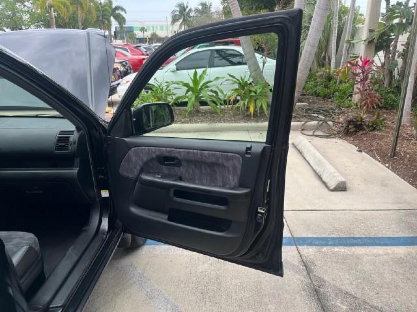 2002 Nighthawk Black Pearl /Black Honda CR-V 1 FL LX LOW MILES 66,596 (JHLRD68532C) with an 2.4L DOHC i-VTEC 16-Valve I4 Engine engine, Automatic transmission, located at 4701 North Dixie Hwy, Pompano Beach, FL, 33064, (954) 422-2889, 26.240938, -80.123474 - 2002 HONDA CR-V LX ROAD READY 2,4L I4 VIN: JHLRD68532C015076 NO ACCIDENTS 28 MPG 4 DOOR WAGON/SPORT UTILITY NO RECALLS 2.4L I4 F DOHC 1 OWNER FLORIDA GASOLINE LOW MILES 66,596 FRONT WHEEL DRIVE 9 SERVICE RECORDS Approach Lights Cruise Control FWD Front Bucket Seats THIS IS ONE OF THE NICEST HONDA CR - Photo#11