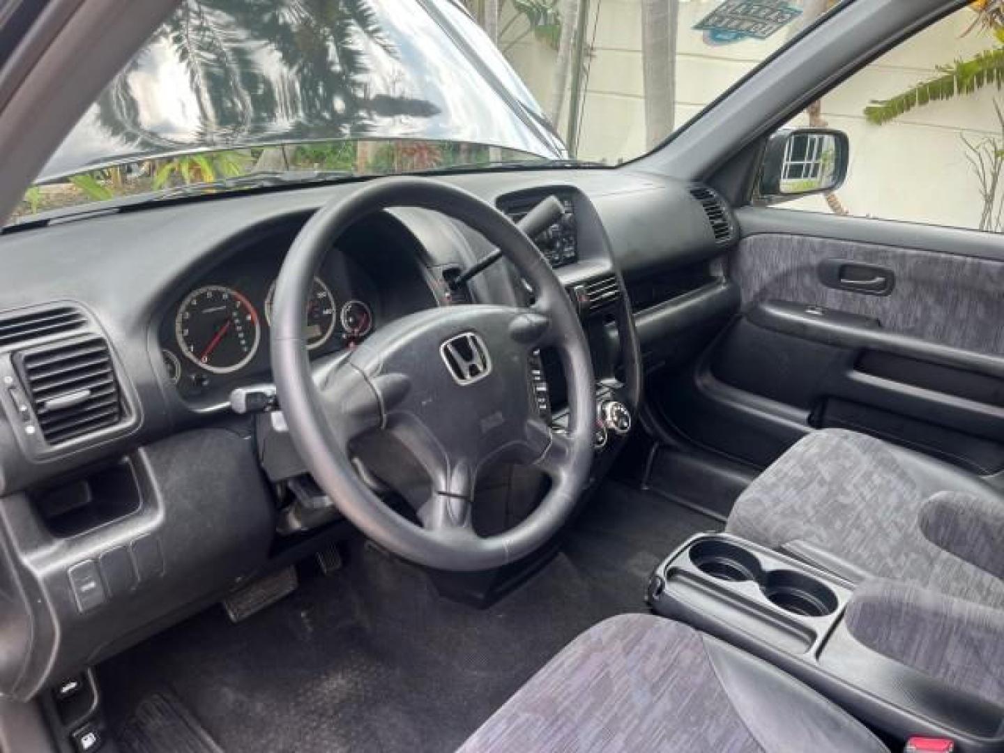 2002 Nighthawk Black Pearl /Black Honda CR-V 1 FL LX LOW MILES 66,596 (JHLRD68532C) with an 2.4L DOHC i-VTEC 16-Valve I4 Engine engine, Automatic transmission, located at 4701 North Dixie Hwy, Pompano Beach, FL, 33064, (954) 422-2889, 26.240938, -80.123474 - 2002 HONDA CR-V LX ROAD READY 2,4L I4 VIN: JHLRD68532C015076 NO ACCIDENTS 28 MPG 4 DOOR WAGON/SPORT UTILITY NO RECALLS 2.4L I4 F DOHC 1 OWNER FLORIDA GASOLINE LOW MILES 66,596 FRONT WHEEL DRIVE 9 SERVICE RECORDS Approach Lights Cruise Control FWD Front Bucket Seats THIS IS ONE OF THE NICEST HONDA CR - Photo#44