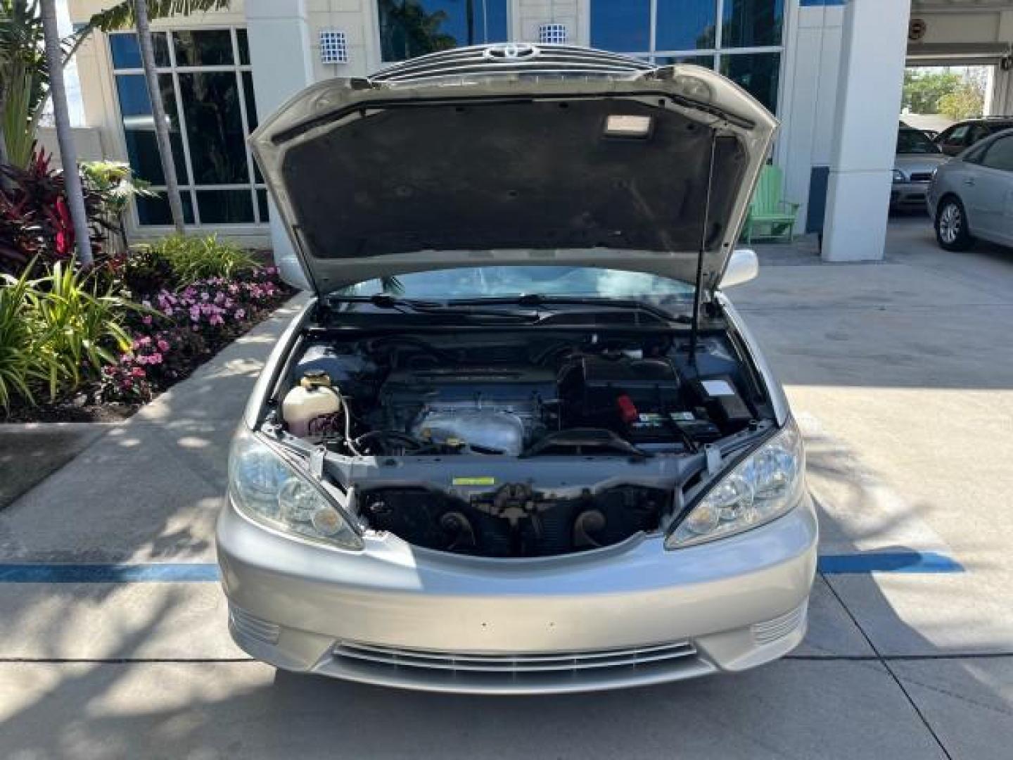 2006 Lunar Mist Metallic /Stone Toyota Camry LE LOW MILES 50,422 (4T1BE30K86U) with an 2.4L DOHC SEFI 16-Valve 4-Cyl Engine engine, Automatic transmission, located at 4701 North Dixie Hwy, Pompano Beach, FL, 33064, (954) 422-2889, 26.240938, -80.123474 - 2006 TOYOTA CAMRY LE ROAD READY 2.4L I4 VIN: 4T1BE30K86U115326 NO RECALLS 34 MPG SEDAN 4 DR FLORIDA OWNER 2.4L I4 F DOHC 16V 19 SERVICE RECORDS GASOLINE LOW MILES 50,422 FRONT WHEEL DRIVE POWER SEATS/MIRRORS Cruise Control Electronic Braking System FWD Front Bucket Seats Steering Wheel Mounted Contr - Photo#66