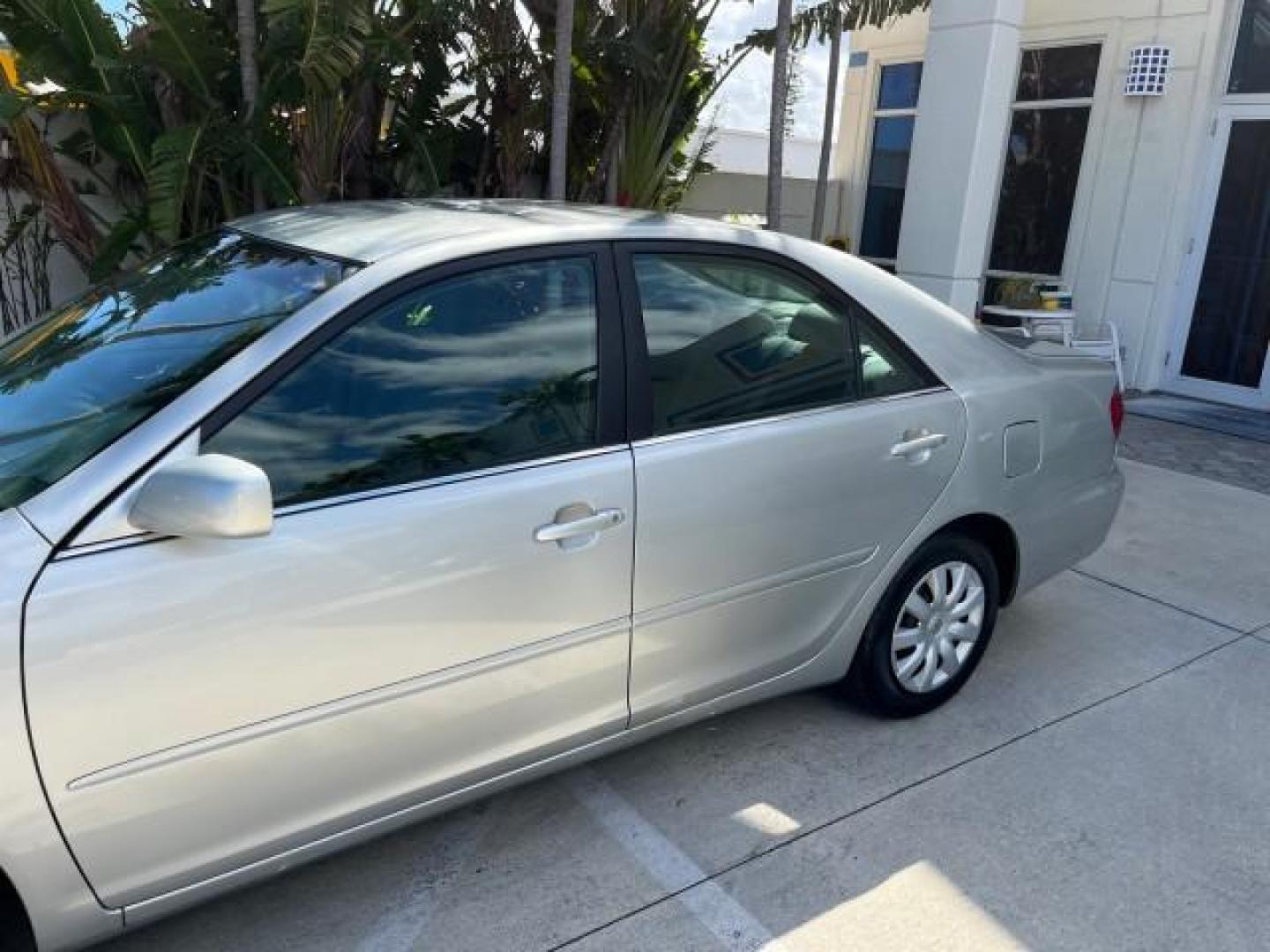 2006 Lunar Mist Metallic /Stone Toyota Camry LE LOW MILES 50,422 (4T1BE30K86U) with an 2.4L DOHC SEFI 16-Valve 4-Cyl Engine engine, Automatic transmission, located at 4701 North Dixie Hwy, Pompano Beach, FL, 33064, (954) 422-2889, 26.240938, -80.123474 - 2006 TOYOTA CAMRY LE ROAD READY 2.4L I4 VIN: 4T1BE30K86U115326 NO RECALLS 34 MPG SEDAN 4 DR FLORIDA OWNER 2.4L I4 F DOHC 16V 19 SERVICE RECORDS GASOLINE LOW MILES 50,422 FRONT WHEEL DRIVE POWER SEATS/MIRRORS Cruise Control Electronic Braking System FWD Front Bucket Seats Steering Wheel Mounted Contr - Photo#83