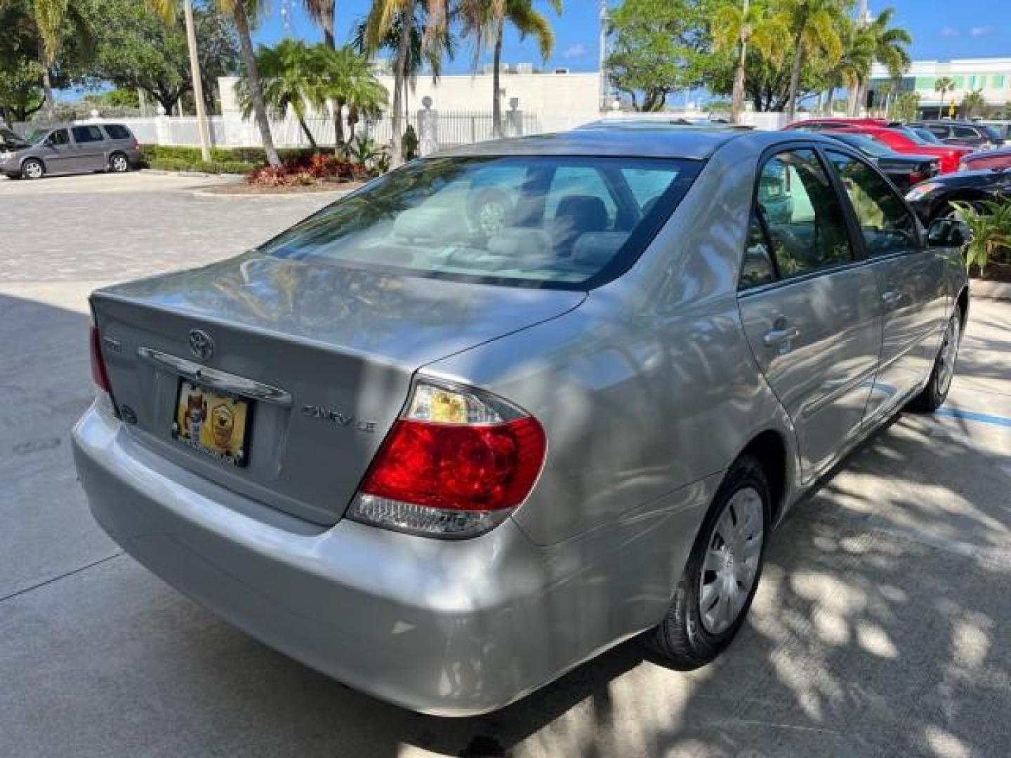 2006 Lunar Mist Metallic /Stone Toyota Camry LE LOW MILES 50,422 (4T1BE30K86U) with an 2.4L DOHC SEFI 16-Valve 4-Cyl Engine engine, Automatic transmission, located at 4701 North Dixie Hwy, Pompano Beach, FL, 33064, (954) 422-2889, 26.240938, -80.123474 - 2006 TOYOTA CAMRY LE ROAD READY 2.4L I4 VIN: 4T1BE30K86U115326 NO RECALLS 34 MPG SEDAN 4 DR FLORIDA OWNER 2.4L I4 F DOHC 16V 19 SERVICE RECORDS GASOLINE LOW MILES 50,422 FRONT WHEEL DRIVE POWER SEATS/MIRRORS Cruise Control Electronic Braking System FWD Front Bucket Seats Steering Wheel Mounted Contr - Photo#96