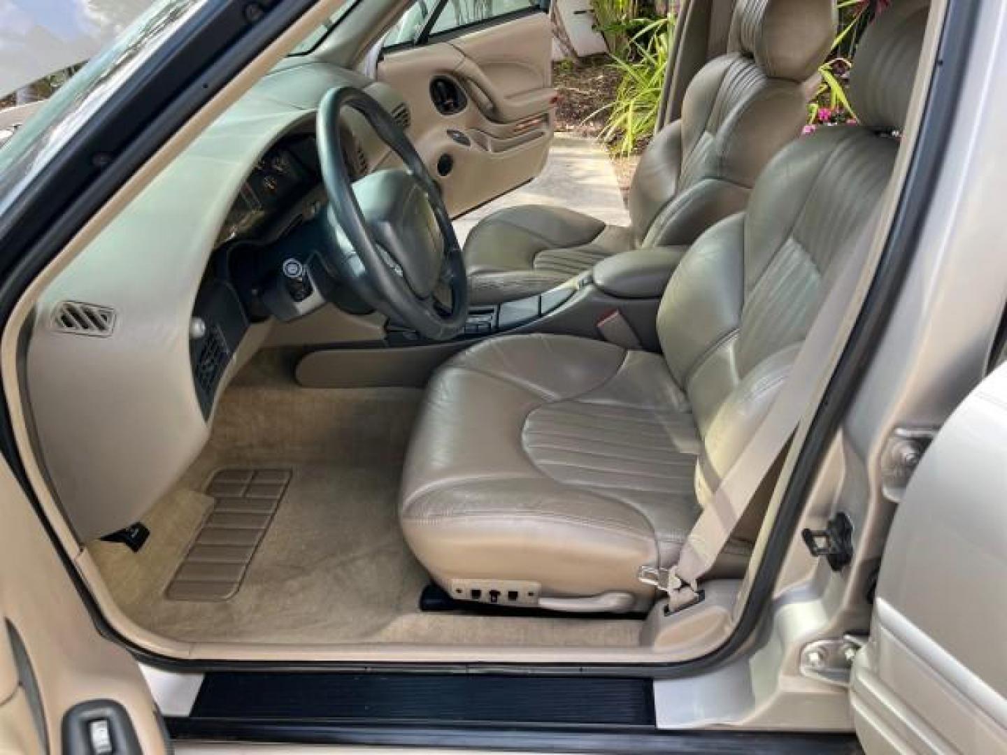 1998 Silvermist (Met) /Camel Pontiac Bonneville SLE LEATHER LOW MILES 43,906 (1G2HX52K4WH) with an 3.8L SFI V6 3800 Series II Engine engine, Automatic transmission, located at 4701 North Dixie Hwy, Pompano Beach, FL, 33064, (954) 422-2889, 26.240938, -80.123474 - 1998 PONTIAC BONNEVILLE SLE LEATHER ROAD READY 3.8L V6 VIN: 1G2HX52K4WH211131 NO ACCIDENTS 30 MPG SEDAN 4 DR NO RECALLS 3.8L V6 F OHV LOW MILES 43,906 GASOLINE POWER LEATHER SEATS FRONT WHEEL DRIVE POWER MIRRORS Alloy Wheels ABS Brakes CD Audio Power Seat(s) Traction Control AM/FM Stereo Cruise Cont - Photo#10