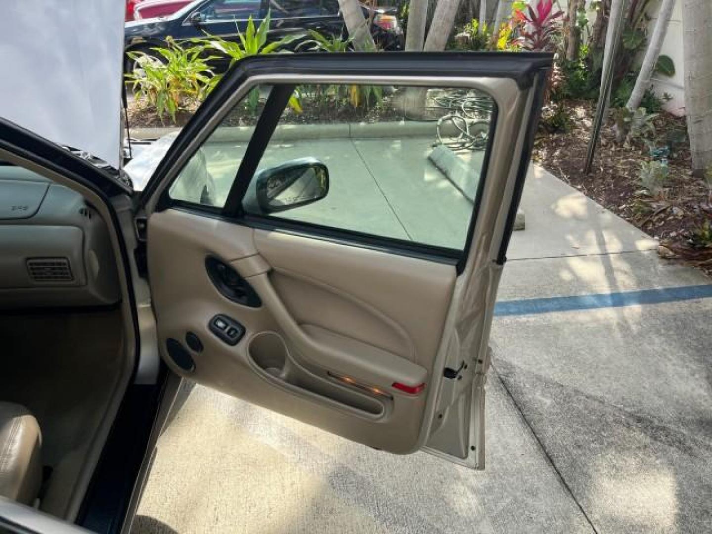 1998 Silvermist (Met) /Camel Pontiac Bonneville SLE LEATHER LOW MILES 43,906 (1G2HX52K4WH) with an 3.8L SFI V6 3800 Series II Engine engine, Automatic transmission, located at 4701 North Dixie Hwy, Pompano Beach, FL, 33064, (954) 422-2889, 26.240938, -80.123474 - 1998 PONTIAC BONNEVILLE SLE LEATHER ROAD READY 3.8L V6 VIN: 1G2HX52K4WH211131 NO ACCIDENTS 30 MPG SEDAN 4 DR NO RECALLS 3.8L V6 F OHV LOW MILES 43,906 GASOLINE POWER LEATHER SEATS FRONT WHEEL DRIVE POWER MIRRORS Alloy Wheels ABS Brakes CD Audio Power Seat(s) Traction Control AM/FM Stereo Cruise Cont - Photo#11