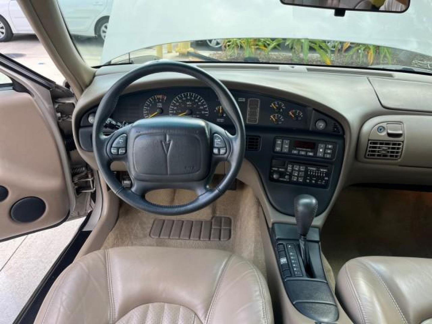 1998 Silvermist (Met) /Camel Pontiac Bonneville SLE LEATHER LOW MILES 43,906 (1G2HX52K4WH) with an 3.8L SFI V6 3800 Series II Engine engine, Automatic transmission, located at 4701 North Dixie Hwy, Pompano Beach, FL, 33064, (954) 422-2889, 26.240938, -80.123474 - 1998 PONTIAC BONNEVILLE SLE LEATHER ROAD READY 3.8L V6 VIN: 1G2HX52K4WH211131 NO ACCIDENTS 30 MPG SEDAN 4 DR NO RECALLS 3.8L V6 F OHV LOW MILES 43,906 GASOLINE POWER LEATHER SEATS FRONT WHEEL DRIVE POWER MIRRORS Alloy Wheels ABS Brakes CD Audio Power Seat(s) Traction Control AM/FM Stereo Cruise Cont - Photo#34