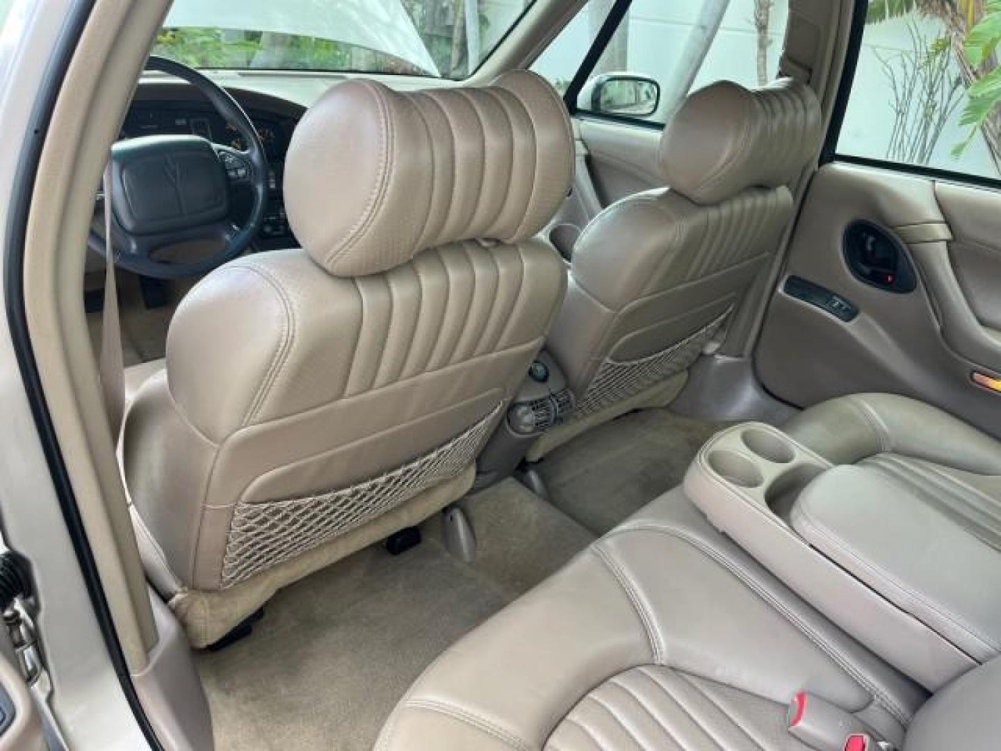 1998 Silvermist (Met) /Camel Pontiac Bonneville SLE LEATHER LOW MILES 43,906 (1G2HX52K4WH) with an 3.8L SFI V6 3800 Series II Engine engine, Automatic transmission, located at 4701 North Dixie Hwy, Pompano Beach, FL, 33064, (954) 422-2889, 26.240938, -80.123474 - 1998 PONTIAC BONNEVILLE SLE LEATHER ROAD READY 3.8L V6 VIN: 1G2HX52K4WH211131 NO ACCIDENTS 30 MPG SEDAN 4 DR NO RECALLS 3.8L V6 F OHV LOW MILES 43,906 GASOLINE POWER LEATHER SEATS FRONT WHEEL DRIVE POWER MIRRORS Alloy Wheels ABS Brakes CD Audio Power Seat(s) Traction Control AM/FM Stereo Cruise Cont - Photo#38