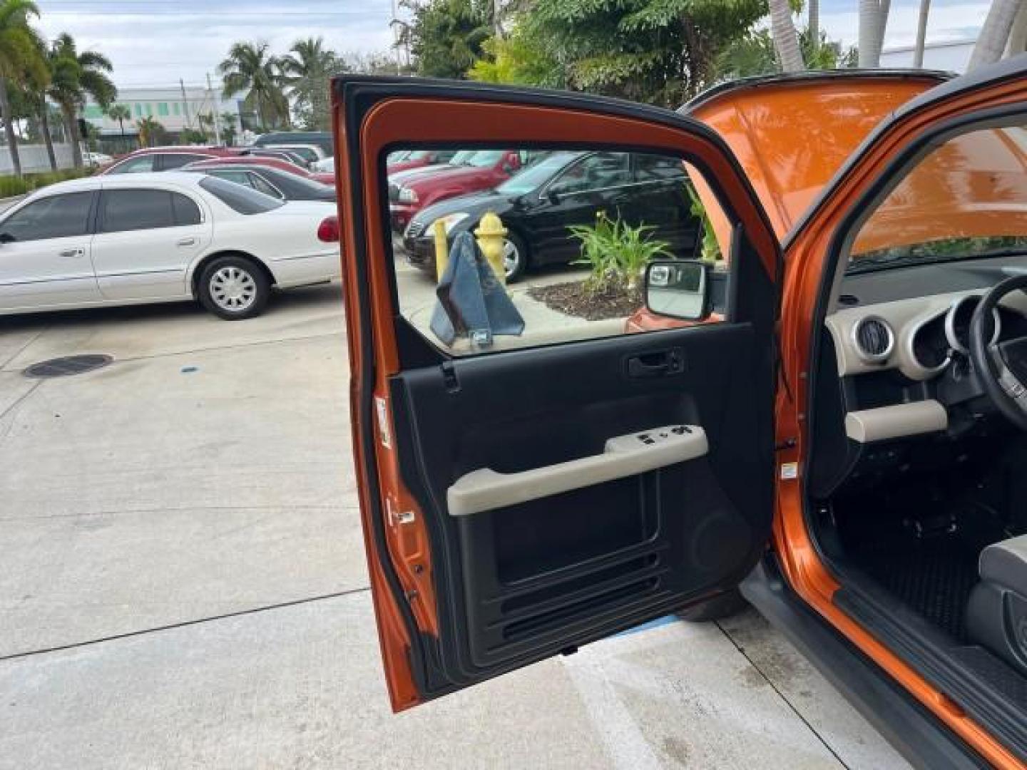 2008 Tangerine Metallic /Gray/Black Honda Element 1 FL EX LOW MILES 83,187 (5J6YH18708L) with an 2.4L DOHC MPFI 16-Valve i-VTEC I4 Engine engine, Automatic transmission, located at 4701 North Dixie Hwy, Pompano Beach, FL, 33064, (954) 422-2889, 26.240938, -80.123474 - 2008 HONDA ELEMENT EX WARRANTY IS INCLUDED ROAD READY 2.4L I4 VIN: 5J6YH18708L008557 1 OWNER FLORIDA 4 DOOR WAGON/SPORT UTILITY 6 SERVICE RECORDS 2.4L I4 F DOHC 16V LOW MILES 83,187 GASOLINE POWER MIRRORS FRONT WHEEL DRIVE Anti-Theft System Braking Assist Chrome Exhaust Tip Cruise Control Curtain Ai - Photo#9