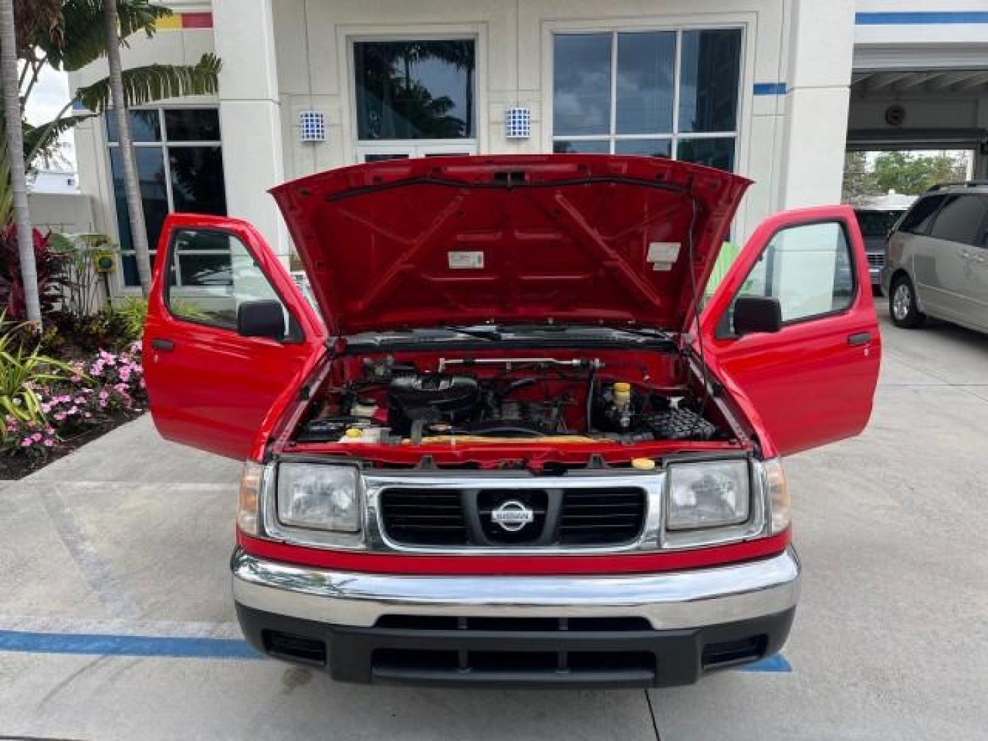 1999 Aztec Red /Gray Nissan Frontier 2WD PU 1 FL XE LOW MILES 56,259 (1N6DD21S5XC) with an 2.4L DOHC SMPI 16-Valve 4-Cyl Engine engine, Automatic transmission, located at 4701 North Dixie Hwy, Pompano Beach, FL, 33064, (954) 422-2889, 26.240938, -80.123474 - 1999 NISSAN FRONTIER XE AUTO AC BEAUTIFUL ROAD READY 2.4L I4 VIN: 1N6DD21S5XC310801 NO ACCIDENTS PICKUP NO RECALLS 6,5 FT BED 2.4L I4 F DOHC 1 OWNER FLORIDA GASOLINE 10 SERVICE RECORDS REAR WHEEL DRIVE LOW MILES 56,259 Alloy Wheels Cloth Seats Bed Liner ABS Brakes Air Conditioning Cassette Player AM - Photo#14