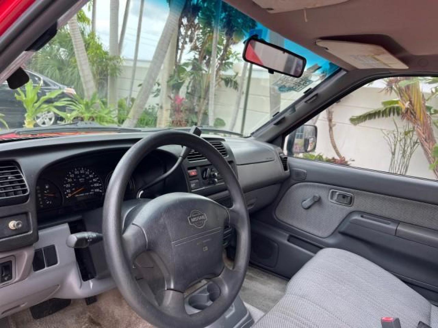 1999 Aztec Red /Gray Nissan Frontier 2WD PU 1 FL XE LOW MILES 56,259 (1N6DD21S5XC) with an 2.4L DOHC SMPI 16-Valve 4-Cyl Engine engine, Automatic transmission, located at 4701 North Dixie Hwy, Pompano Beach, FL, 33064, (954) 422-2889, 26.240938, -80.123474 - 1999 NISSAN FRONTIER XE AUTO AC BEAUTIFUL ROAD READY 2.4L I4 VIN: 1N6DD21S5XC310801 NO ACCIDENTS PICKUP NO RECALLS 6,5 FT BED 2.4L I4 F DOHC 1 OWNER FLORIDA GASOLINE 10 SERVICE RECORDS REAR WHEEL DRIVE LOW MILES 56,259 Alloy Wheels Cloth Seats Bed Liner ABS Brakes Air Conditioning Cassette Player AM - Photo#22