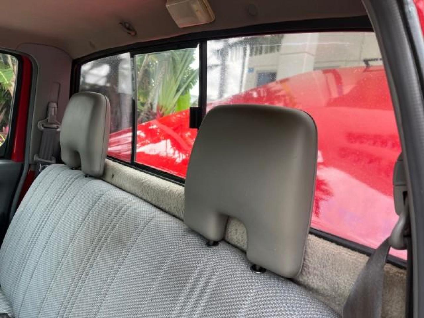 1999 Aztec Red /Gray Nissan Frontier 2WD PU 1 FL XE LOW MILES 56,259 (1N6DD21S5XC) with an 2.4L DOHC SMPI 16-Valve 4-Cyl Engine engine, Automatic transmission, located at 4701 North Dixie Hwy, Pompano Beach, FL, 33064, (954) 422-2889, 26.240938, -80.123474 - 1999 NISSAN FRONTIER XE AUTO AC BEAUTIFUL ROAD READY 2.4L I4 VIN: 1N6DD21S5XC310801 NO ACCIDENTS PICKUP NO RECALLS 6,5 FT BED 2.4L I4 F DOHC 1 OWNER FLORIDA GASOLINE 10 SERVICE RECORDS REAR WHEEL DRIVE LOW MILES 56,259 Alloy Wheels Cloth Seats Bed Liner ABS Brakes Air Conditioning Cassette Player AM - Photo#29