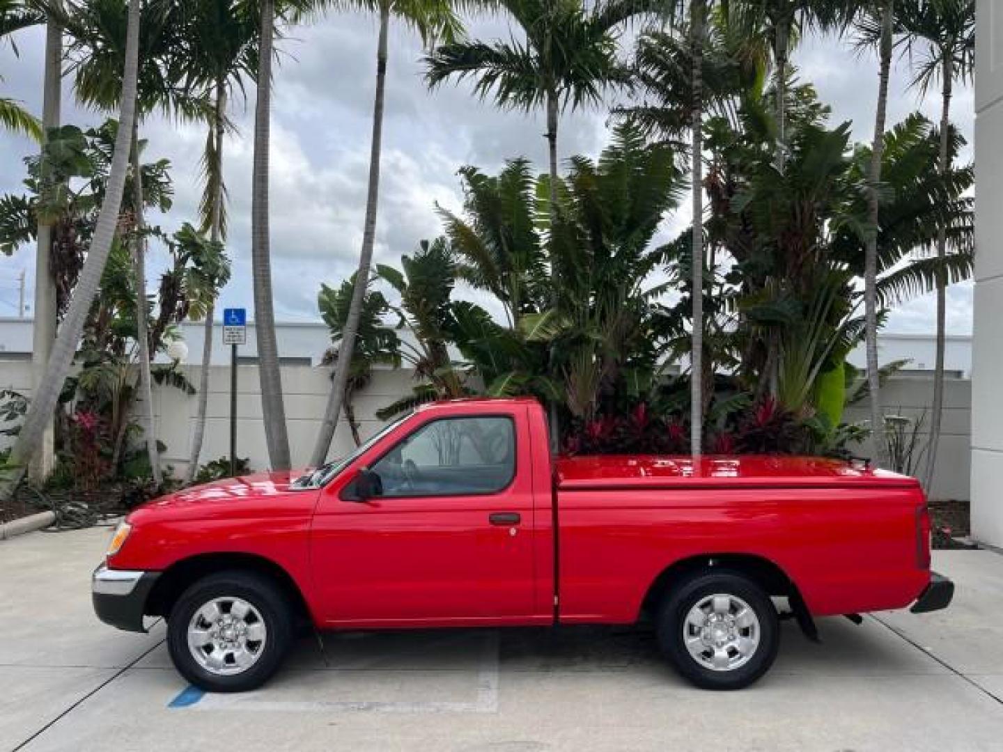 1999 Aztec Red /Gray Nissan Frontier 2WD PU 1 FL XE LOW MILES 56,259 (1N6DD21S5XC) with an 2.4L DOHC SMPI 16-Valve 4-Cyl Engine engine, Automatic transmission, located at 4701 North Dixie Hwy, Pompano Beach, FL, 33064, (954) 422-2889, 26.240938, -80.123474 - 1999 NISSAN FRONTIER XE AUTO AC BEAUTIFUL ROAD READY 2.4L I4 VIN: 1N6DD21S5XC310801 NO ACCIDENTS PICKUP NO RECALLS 6,5 FT BED 2.4L I4 F DOHC 1 OWNER FLORIDA GASOLINE 10 SERVICE RECORDS REAR WHEEL DRIVE LOW MILES 56,259 Alloy Wheels Cloth Seats Bed Liner ABS Brakes Air Conditioning Cassette Player AM - Photo#4