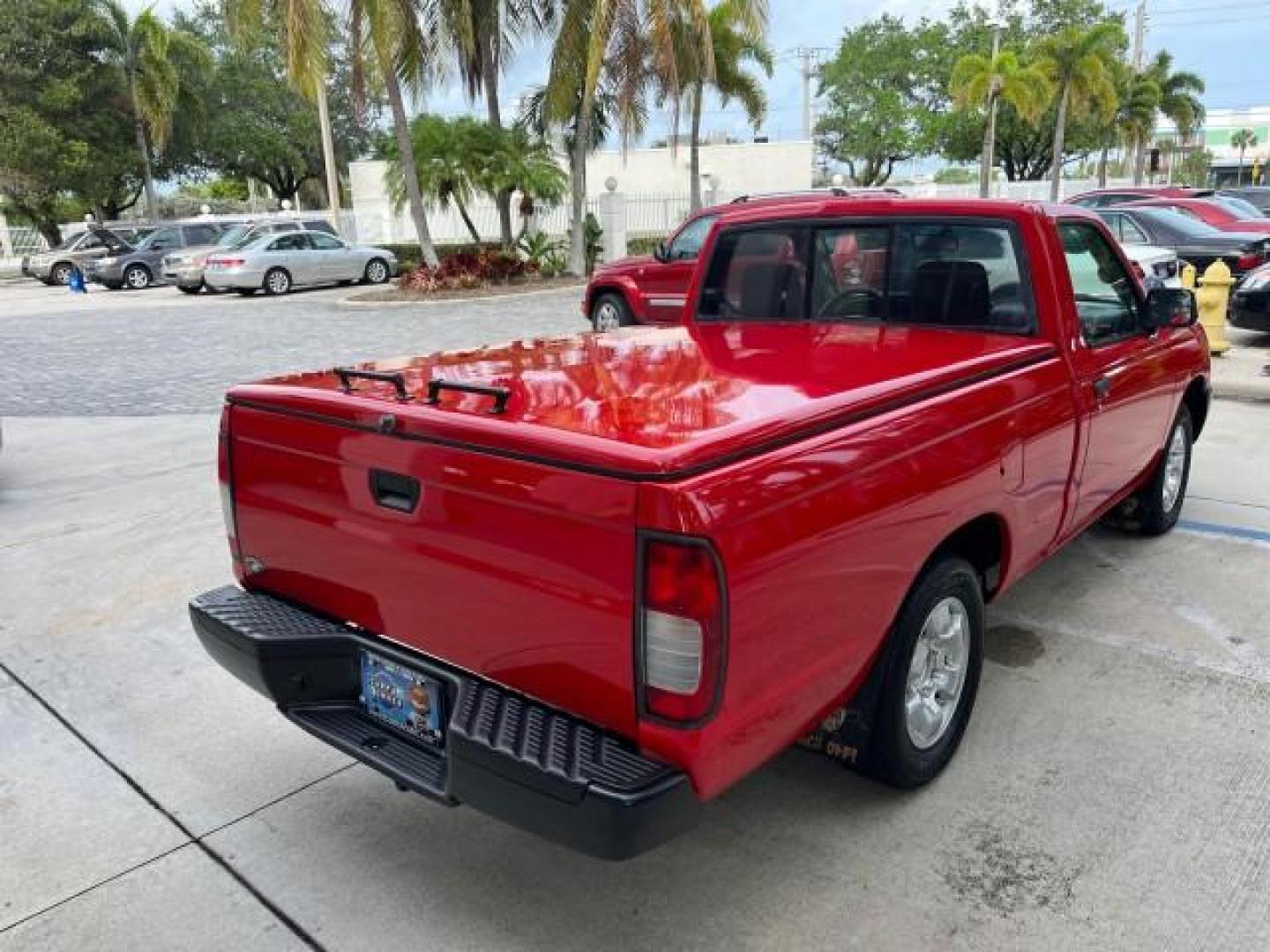 1999 Aztec Red /Gray Nissan Frontier 2WD PU 1 FL XE LOW MILES 56,259 (1N6DD21S5XC) with an 2.4L DOHC SMPI 16-Valve 4-Cyl Engine engine, Automatic transmission, located at 4701 North Dixie Hwy, Pompano Beach, FL, 33064, (954) 422-2889, 26.240938, -80.123474 - 1999 NISSAN FRONTIER XE AUTO AC BEAUTIFUL ROAD READY 2.4L I4 VIN: 1N6DD21S5XC310801 NO ACCIDENTS PICKUP NO RECALLS 6,5 FT BED 2.4L I4 F DOHC 1 OWNER FLORIDA GASOLINE 10 SERVICE RECORDS REAR WHEEL DRIVE LOW MILES 56,259 Alloy Wheels Cloth Seats Bed Liner ABS Brakes Air Conditioning Cassette Player AM - Photo#71