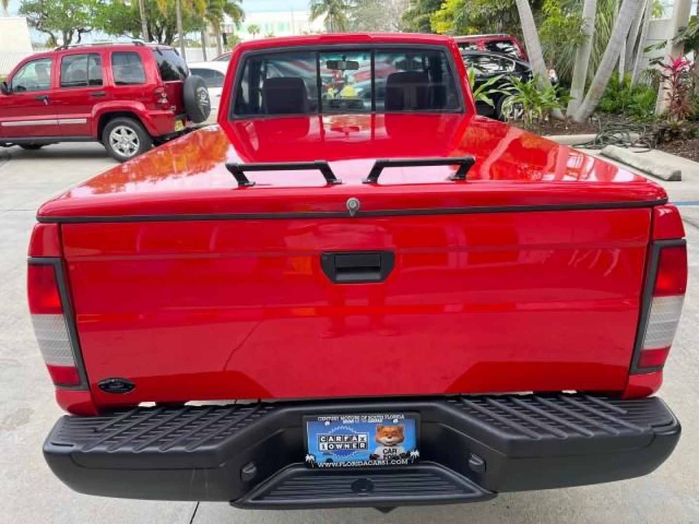 1999 Aztec Red /Gray Nissan Frontier 2WD PU 1 FL XE LOW MILES 56,259 (1N6DD21S5XC) with an 2.4L DOHC SMPI 16-Valve 4-Cyl Engine engine, Automatic transmission, located at 4701 North Dixie Hwy, Pompano Beach, FL, 33064, (954) 422-2889, 26.240938, -80.123474 - 1999 NISSAN FRONTIER XE AUTO AC BEAUTIFUL ROAD READY 2.4L I4 VIN: 1N6DD21S5XC310801 NO ACCIDENTS PICKUP NO RECALLS 6,5 FT BED 2.4L I4 F DOHC 1 OWNER FLORIDA GASOLINE 10 SERVICE RECORDS REAR WHEEL DRIVE LOW MILES 56,259 Alloy Wheels Cloth Seats Bed Liner ABS Brakes Air Conditioning Cassette Player AM - Photo#79