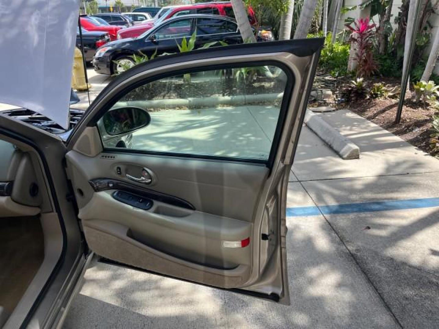 2003 Light Bronzemist Metallic /Taupe Buick 1 FL LeSabre LOW MILES 36,604 Limited (1G4HR54K23U) with an 3.8L 3800 V6 SFI Engine engine, Automatic transmission, located at 4701 North Dixie Hwy, Pompano Beach, FL, 33064, (954) 422-2889, 26.240938, -80.123474 - 2003 BUICK LESABRE LIMITED NEW $31,420 ROAD READY VIN: 1G4HR54K23U191835 NO ACCIDENTS 3.8L V6 SEDAN 4 DR 10 SERVICE RECORDS NO RECALLS 29 MPG 3.8L V6 F 12V HEATED SEATS/MIRRORS 1 OWNER FLORIDA GASOLINE DUAL ZONE AC LOW MILES 36,604 FRONT WHEEL DRIVE LIMITED POWER LEATHER SEATS Air Suspension Alloy W - Photo#11