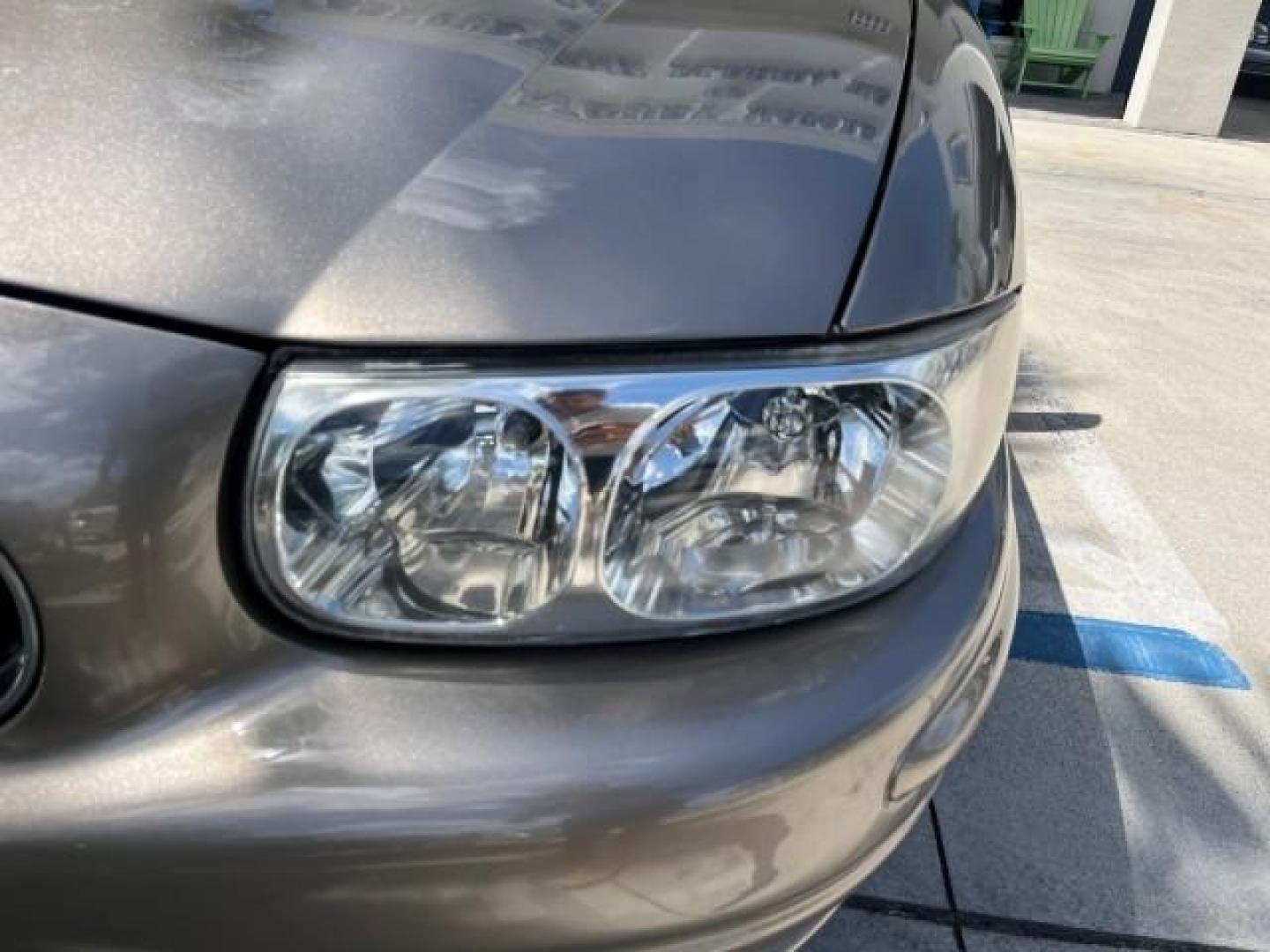 2003 Light Bronzemist Metallic /Taupe Buick 1 FL LeSabre LOW MILES 36,604 Limited (1G4HR54K23U) with an 3.8L 3800 V6 SFI Engine engine, Automatic transmission, located at 4701 North Dixie Hwy, Pompano Beach, FL, 33064, (954) 422-2889, 26.240938, -80.123474 - 2003 BUICK LESABRE LIMITED NEW $31,420 ROAD READY VIN: 1G4HR54K23U191835 NO ACCIDENTS 3.8L V6 SEDAN 4 DR 10 SERVICE RECORDS NO RECALLS 29 MPG 3.8L V6 F 12V HEATED SEATS/MIRRORS 1 OWNER FLORIDA GASOLINE DUAL ZONE AC LOW MILES 36,604 FRONT WHEEL DRIVE LIMITED POWER LEATHER SEATS Air Suspension Alloy W - Photo#66