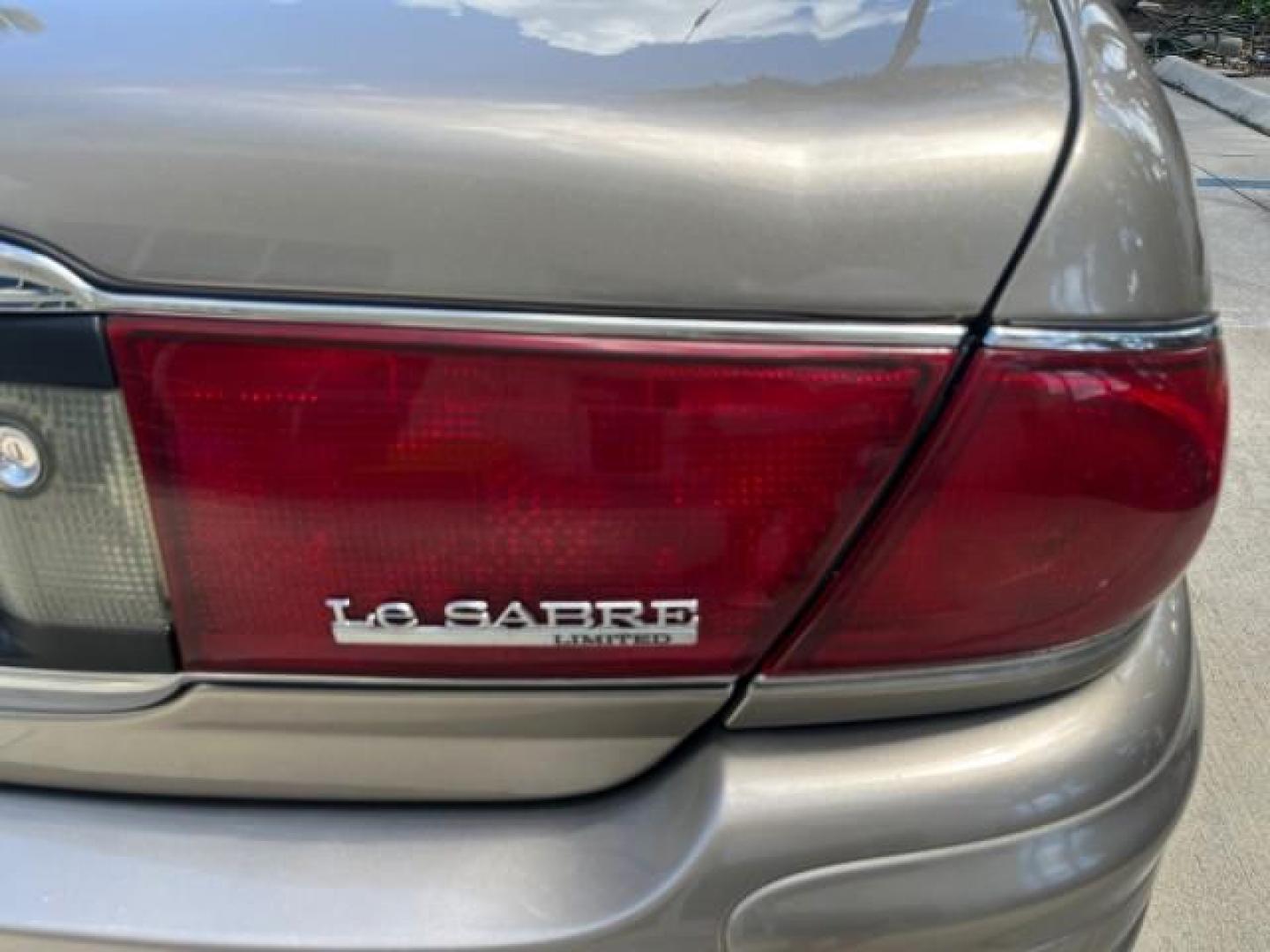 2003 Light Bronzemist Metallic /Taupe Buick 1 FL LeSabre LOW MILES 36,604 Limited (1G4HR54K23U) with an 3.8L 3800 V6 SFI Engine engine, Automatic transmission, located at 4701 North Dixie Hwy, Pompano Beach, FL, 33064, (954) 422-2889, 26.240938, -80.123474 - 2003 BUICK LESABRE LIMITED NEW $31,420 ROAD READY VIN: 1G4HR54K23U191835 NO ACCIDENTS 3.8L V6 SEDAN 4 DR 10 SERVICE RECORDS NO RECALLS 29 MPG 3.8L V6 F 12V HEATED SEATS/MIRRORS 1 OWNER FLORIDA GASOLINE DUAL ZONE AC LOW MILES 36,604 FRONT WHEEL DRIVE LIMITED POWER LEATHER SEATS Air Suspension Alloy W - Photo#96