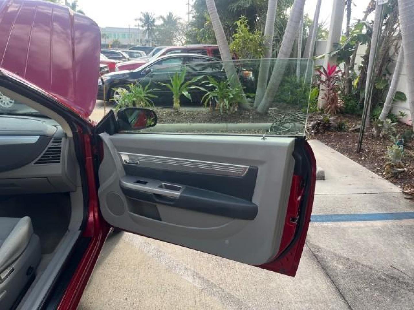 2008 Inferno Red Crystal /Slate Gray Chrysler Sebring Touring LOW MILES 31,526 (1C3LC55R18N) with an 2.7L V6 Cylinder Engine engine, Automatic transmission, located at 4701 North Dixie Hwy, Pompano Beach, FL, 33064, (954) 422-2889, 26.240938, -80.123474 - 2008 CHRYSLER SEBRING TOURING ROAD READY 2.7L V6 VIN: 1C3LC55R18N627589 LOW MILES 31,526 CONVERTIBLE FLORIDA OWNER 2.7L V6 F DOHC 24V POWER CONVERTIBLE TOP GASOLINE NO ACCIDENTS NO RECALLAS FRONT WHEEL DRIVE 18 SERVICE RECORDS Anti-Theft System Cruise Control Electronic Braking System FWD Front Buck - Photo#13