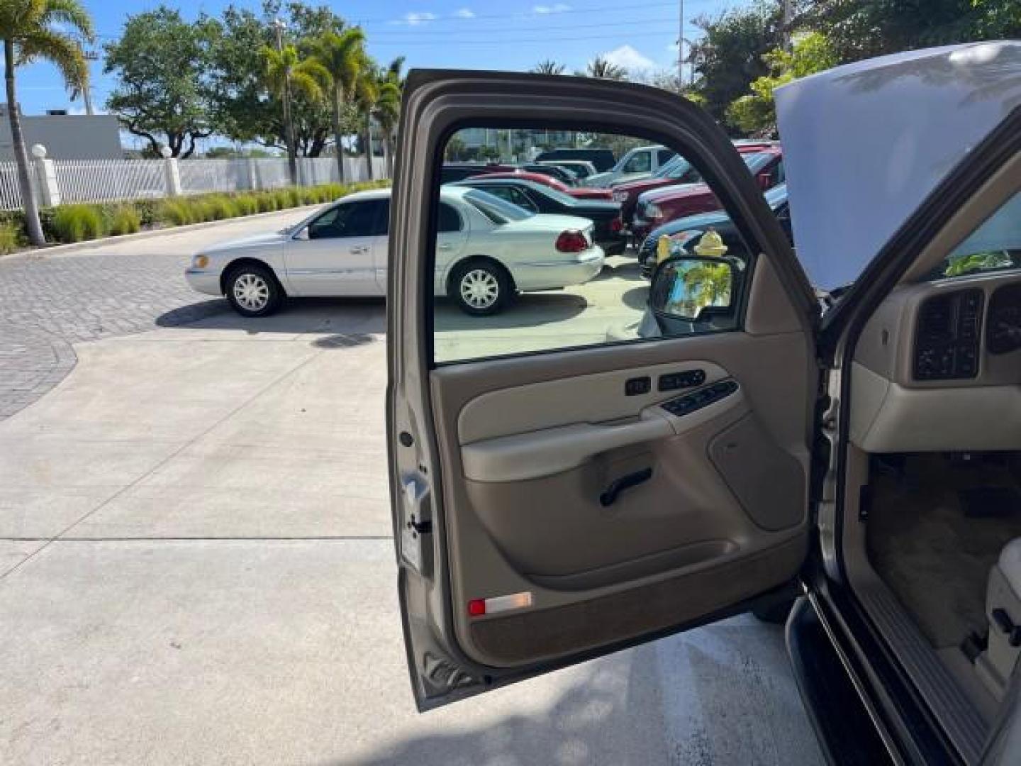 2003 Dark Gray Metallic /Tan/Neutral Chevrolet Suburban 1 OWNER LT LOW MI 4X4 94,103 (1GNFK16Z03J) with an 5.3L Vortec 5300 V8 SFI Bi-Fuel Engine engine, Automatic transmission, located at 4701 North Dixie Hwy, Pompano Beach, FL, 33064, (954) 422-2889, 26.240938, -80.123474 - 2003 CHEVROLET SUBURBAN 1500 ROAD READY 5.3L V8 VIN: 1GNFK16Z03J272179 NO RECALLS 4X4 4 DOOR WAGON/SPORT UTILITY LOW MILES 94,103 5.3L V8 F 1 OWNER DVD FLEX FUEL NEW$42,890 LEATHER SEATS REAR WHEEL DRIVE W/ 4X4 3 ROW SEATS POWER MIRRORS/SEATS ABS Brakes Automatic Transmission Power Locks Power Windo - Photo#9