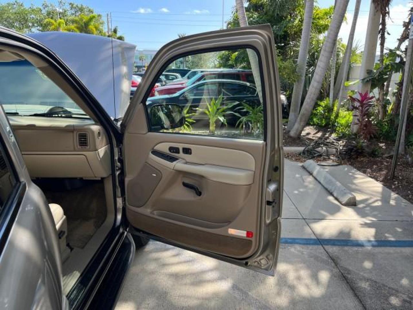 2003 Dark Gray Metallic /Tan/Neutral Chevrolet Suburban 1 OWNER LT LOW MI 4X4 94,103 (1GNFK16Z03J) with an 5.3L Vortec 5300 V8 SFI Bi-Fuel Engine engine, Automatic transmission, located at 4701 North Dixie Hwy, Pompano Beach, FL, 33064, (954) 422-2889, 26.240938, -80.123474 - 2003 CHEVROLET SUBURBAN 1500 ROAD READY 5.3L V8 VIN: 1GNFK16Z03J272179 NO RECALLS 4X4 4 DOOR WAGON/SPORT UTILITY LOW MILES 94,103 5.3L V8 F 1 OWNER DVD FLEX FUEL NEW$42,890 LEATHER SEATS REAR WHEEL DRIVE W/ 4X4 3 ROW SEATS POWER MIRRORS/SEATS ABS Brakes Automatic Transmission Power Locks Power Windo - Photo#11