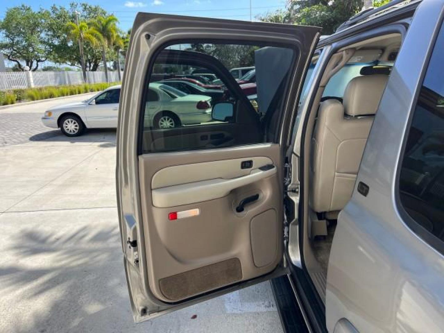 2003 Dark Gray Metallic /Tan/Neutral Chevrolet Suburban 1 OWNER LT LOW MI 4X4 94,103 (1GNFK16Z03J) with an 5.3L Vortec 5300 V8 SFI Bi-Fuel Engine engine, Automatic transmission, located at 4701 North Dixie Hwy, Pompano Beach, FL, 33064, (954) 422-2889, 26.240938, -80.123474 - 2003 CHEVROLET SUBURBAN 1500 ROAD READY 5.3L V8 VIN: 1GNFK16Z03J272179 NO RECALLS 4X4 4 DOOR WAGON/SPORT UTILITY LOW MILES 94,103 5.3L V8 F 1 OWNER DVD FLEX FUEL NEW$42,890 LEATHER SEATS REAR WHEEL DRIVE W/ 4X4 3 ROW SEATS POWER MIRRORS/SEATS ABS Brakes Automatic Transmission Power Locks Power Windo - Photo#14