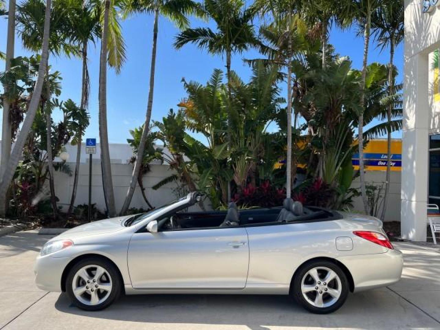 2005 Lunar Mist Metallic /Dark Charcoal Toyota Camry Solara SLE LOW MILES 34,834 (4T1FA38P15U) with an 3.3L DOHC SEFI VVT-i 24-Valve V6 Engine engine, Automatic transmission, located at 4701 North Dixie Hwy, Pompano Beach, FL, 33064, (954) 422-2889, 26.240938, -80.123474 - 2005 TOYOTA CAMRY SOLARA SLE V6 ROAD READY 3.3L V6 VIN: 4T1FA38P15U049746 LOW MILES 34,834 CONVERTIBLE FLORIDA OWNER 29 MPG 3.3L V6 F DOHC 24V SLE POWER CONVERTIBLE TOP GASOLINE NO RECALLS POWER LEATHER SEATS FRONT WHEEL DRIVE NO ACCIDENTS 14 SERVICE RECORDS Alloy Wheels Anti-Theft System Auto-dimmi - Photo#9