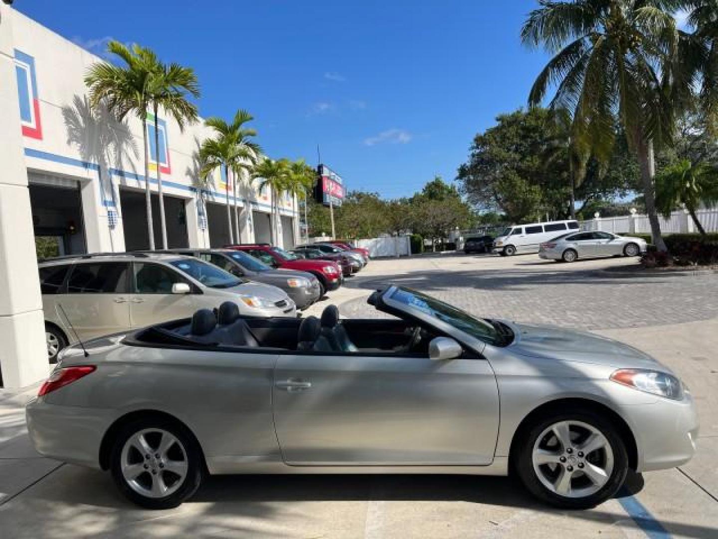 2005 Lunar Mist Metallic /Dark Charcoal Toyota Camry Solara SLE LOW MILES 34,834 (4T1FA38P15U) with an 3.3L DOHC SEFI VVT-i 24-Valve V6 Engine engine, Automatic transmission, located at 4701 North Dixie Hwy, Pompano Beach, FL, 33064, (954) 422-2889, 26.240938, -80.123474 - 2005 TOYOTA CAMRY SOLARA SLE V6 ROAD READY 3.3L V6 VIN: 4T1FA38P15U049746 LOW MILES 34,834 CONVERTIBLE FLORIDA OWNER 29 MPG 3.3L V6 F DOHC 24V SLE POWER CONVERTIBLE TOP GASOLINE NO RECALLS POWER LEATHER SEATS FRONT WHEEL DRIVE NO ACCIDENTS 14 SERVICE RECORDS Alloy Wheels Anti-Theft System Auto-dimmi - Photo#10