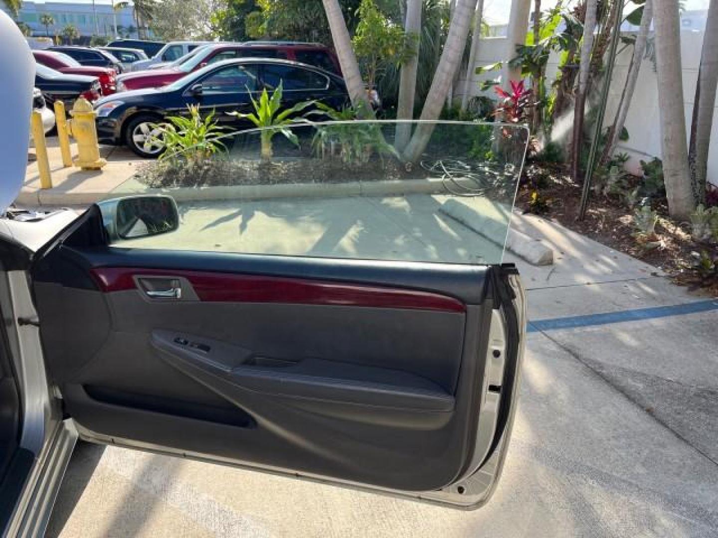 2005 Lunar Mist Metallic /Dark Charcoal Toyota Camry Solara SLE LOW MILES 34,834 (4T1FA38P15U) with an 3.3L DOHC SEFI VVT-i 24-Valve V6 Engine engine, Automatic transmission, located at 4701 North Dixie Hwy, Pompano Beach, FL, 33064, (954) 422-2889, 26.240938, -80.123474 - 2005 TOYOTA CAMRY SOLARA SLE V6 ROAD READY 3.3L V6 VIN: 4T1FA38P15U049746 LOW MILES 34,834 CONVERTIBLE FLORIDA OWNER 29 MPG 3.3L V6 F DOHC 24V SLE POWER CONVERTIBLE TOP GASOLINE NO RECALLS POWER LEATHER SEATS FRONT WHEEL DRIVE NO ACCIDENTS 14 SERVICE RECORDS Alloy Wheels Anti-Theft System Auto-dimmi - Photo#13