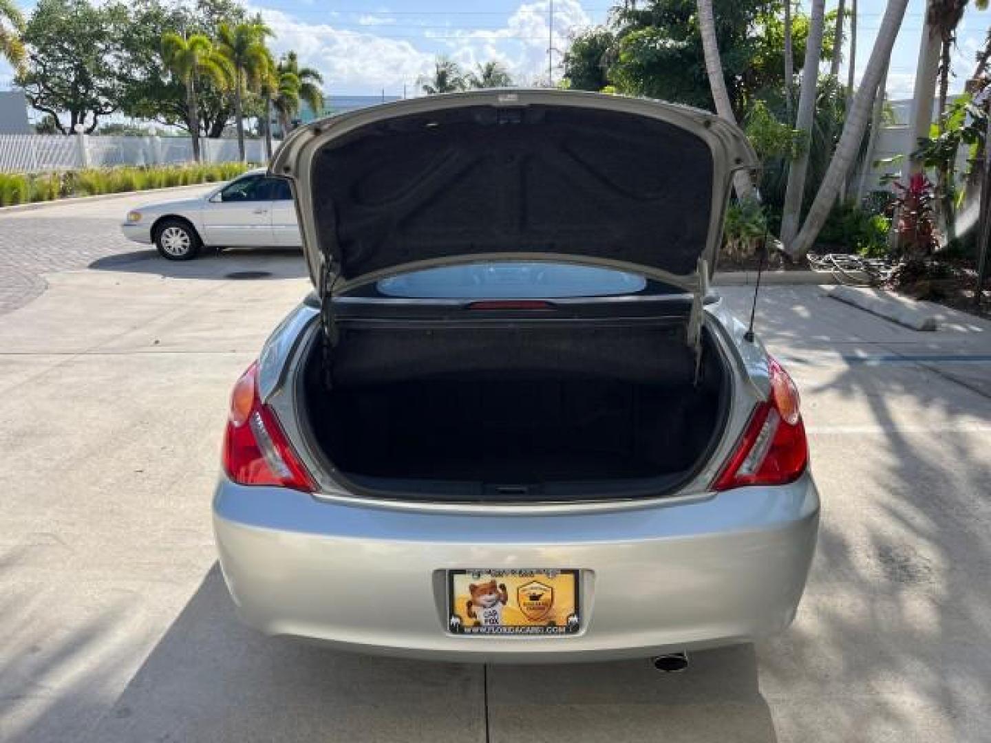 2005 Lunar Mist Metallic /Dark Charcoal Toyota Camry Solara SLE LOW MILES 34,834 (4T1FA38P15U) with an 3.3L DOHC SEFI VVT-i 24-Valve V6 Engine engine, Automatic transmission, located at 4701 North Dixie Hwy, Pompano Beach, FL, 33064, (954) 422-2889, 26.240938, -80.123474 - 2005 TOYOTA CAMRY SOLARA SLE V6 ROAD READY 3.3L V6 VIN: 4T1FA38P15U049746 LOW MILES 34,834 CONVERTIBLE FLORIDA OWNER 29 MPG 3.3L V6 F DOHC 24V SLE POWER CONVERTIBLE TOP GASOLINE NO RECALLS POWER LEATHER SEATS FRONT WHEEL DRIVE NO ACCIDENTS 14 SERVICE RECORDS Alloy Wheels Anti-Theft System Auto-dimmi - Photo#57