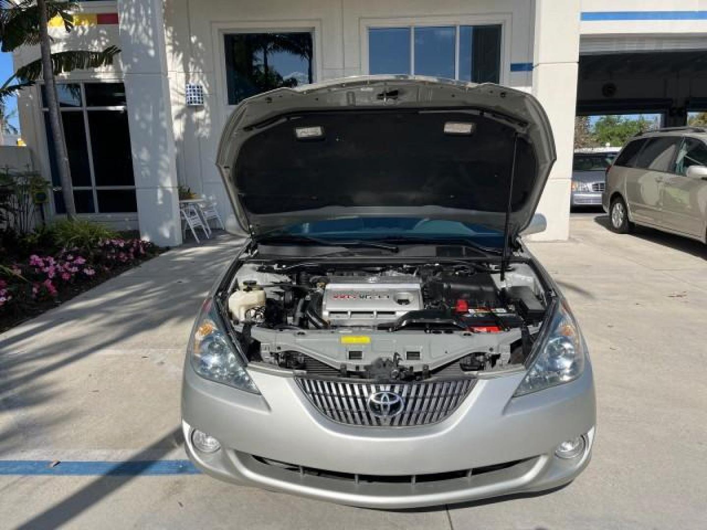 2005 Lunar Mist Metallic /Dark Charcoal Toyota Camry Solara SLE LOW MILES 34,834 (4T1FA38P15U) with an 3.3L DOHC SEFI VVT-i 24-Valve V6 Engine engine, Automatic transmission, located at 4701 North Dixie Hwy, Pompano Beach, FL, 33064, (954) 422-2889, 26.240938, -80.123474 - 2005 TOYOTA CAMRY SOLARA SLE V6 ROAD READY 3.3L V6 VIN: 4T1FA38P15U049746 LOW MILES 34,834 CONVERTIBLE FLORIDA OWNER 29 MPG 3.3L V6 F DOHC 24V SLE POWER CONVERTIBLE TOP GASOLINE NO RECALLS POWER LEATHER SEATS FRONT WHEEL DRIVE NO ACCIDENTS 14 SERVICE RECORDS Alloy Wheels Anti-Theft System Auto-dimmi - Photo#58