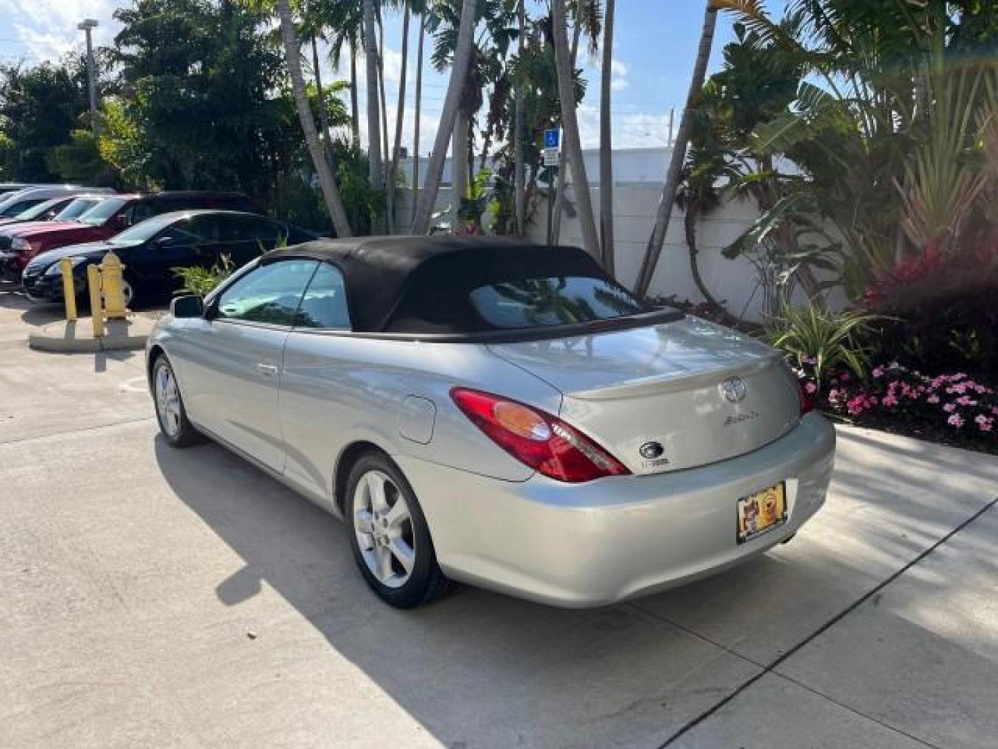 2005 Lunar Mist Metallic /Dark Charcoal Toyota Camry Solara SLE LOW MILES 34,834 (4T1FA38P15U) with an 3.3L DOHC SEFI VVT-i 24-Valve V6 Engine engine, Automatic transmission, located at 4701 North Dixie Hwy, Pompano Beach, FL, 33064, (954) 422-2889, 26.240938, -80.123474 - 2005 TOYOTA CAMRY SOLARA SLE V6 ROAD READY 3.3L V6 VIN: 4T1FA38P15U049746 LOW MILES 34,834 CONVERTIBLE FLORIDA OWNER 29 MPG 3.3L V6 F DOHC 24V SLE POWER CONVERTIBLE TOP GASOLINE NO RECALLS POWER LEATHER SEATS FRONT WHEEL DRIVE NO ACCIDENTS 14 SERVICE RECORDS Alloy Wheels Anti-Theft System Auto-dimmi - Photo#5