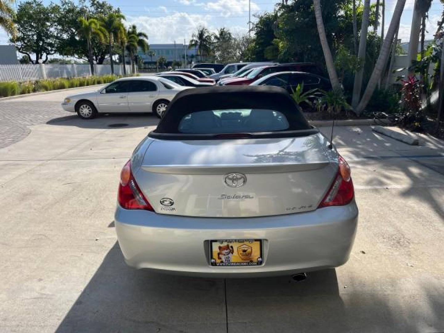 2005 Lunar Mist Metallic /Dark Charcoal Toyota Camry Solara SLE LOW MILES 34,834 (4T1FA38P15U) with an 3.3L DOHC SEFI VVT-i 24-Valve V6 Engine engine, Automatic transmission, located at 4701 North Dixie Hwy, Pompano Beach, FL, 33064, (954) 422-2889, 26.240938, -80.123474 - 2005 TOYOTA CAMRY SOLARA SLE V6 ROAD READY 3.3L V6 VIN: 4T1FA38P15U049746 LOW MILES 34,834 CONVERTIBLE FLORIDA OWNER 29 MPG 3.3L V6 F DOHC 24V SLE POWER CONVERTIBLE TOP GASOLINE NO RECALLS POWER LEATHER SEATS FRONT WHEEL DRIVE NO ACCIDENTS 14 SERVICE RECORDS Alloy Wheels Anti-Theft System Auto-dimmi - Photo#6