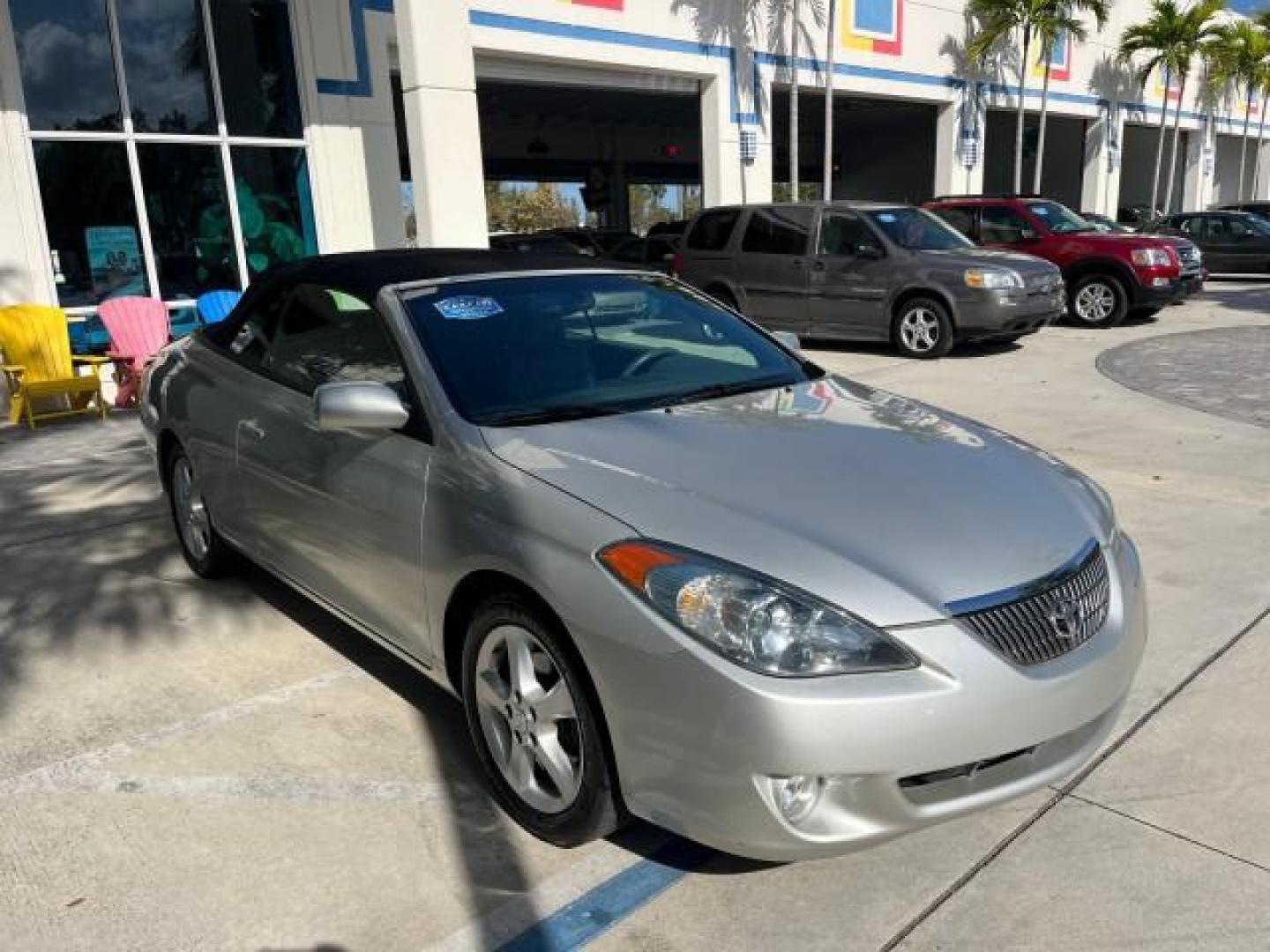 2005 Lunar Mist Metallic /Dark Charcoal Toyota Camry Solara SLE LOW MILES 34,834 (4T1FA38P15U) with an 3.3L DOHC SEFI VVT-i 24-Valve V6 Engine engine, Automatic transmission, located at 4701 North Dixie Hwy, Pompano Beach, FL, 33064, (954) 422-2889, 26.240938, -80.123474 - 2005 TOYOTA CAMRY SOLARA SLE V6 ROAD READY 3.3L V6 VIN: 4T1FA38P15U049746 LOW MILES 34,834 CONVERTIBLE FLORIDA OWNER 29 MPG 3.3L V6 F DOHC 24V SLE POWER CONVERTIBLE TOP GASOLINE NO RECALLS POWER LEATHER SEATS FRONT WHEEL DRIVE NO ACCIDENTS 14 SERVICE RECORDS Alloy Wheels Anti-Theft System Auto-dimmi - Photo#70