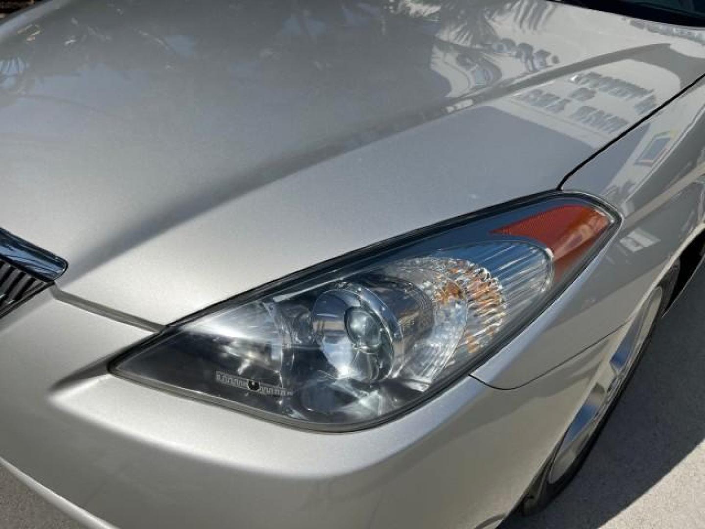 2005 Lunar Mist Metallic /Dark Charcoal Toyota Camry Solara SLE LOW MILES 34,834 (4T1FA38P15U) with an 3.3L DOHC SEFI VVT-i 24-Valve V6 Engine engine, Automatic transmission, located at 4701 North Dixie Hwy, Pompano Beach, FL, 33064, (954) 422-2889, 26.240938, -80.123474 - 2005 TOYOTA CAMRY SOLARA SLE V6 ROAD READY 3.3L V6 VIN: 4T1FA38P15U049746 LOW MILES 34,834 CONVERTIBLE FLORIDA OWNER 29 MPG 3.3L V6 F DOHC 24V SLE POWER CONVERTIBLE TOP GASOLINE NO RECALLS POWER LEATHER SEATS FRONT WHEEL DRIVE NO ACCIDENTS 14 SERVICE RECORDS Alloy Wheels Anti-Theft System Auto-dimmi - Photo#72